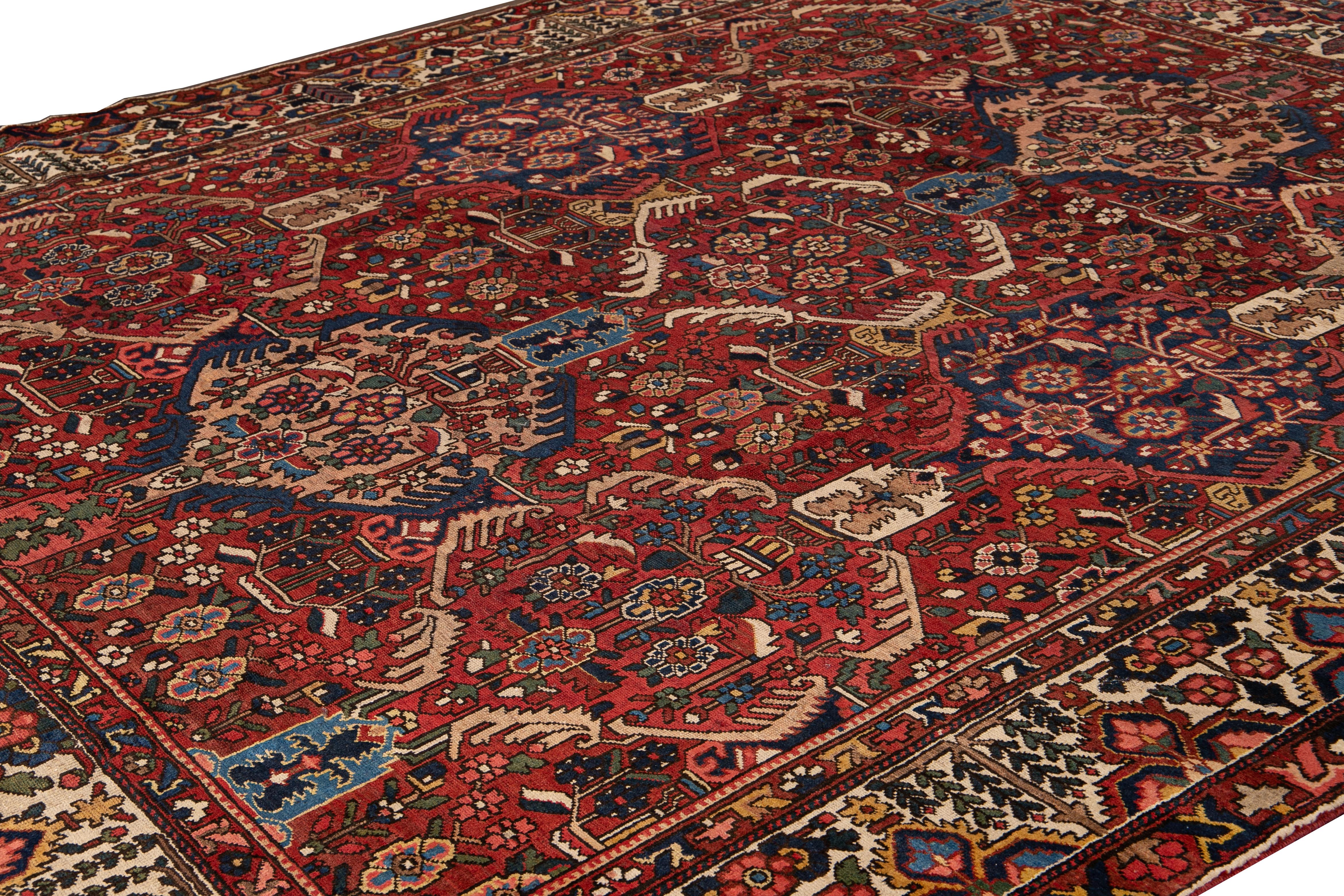 Antique Bakhtiari Persian Handmade Red Floral Wool Rug In Excellent Condition For Sale In Norwalk, CT