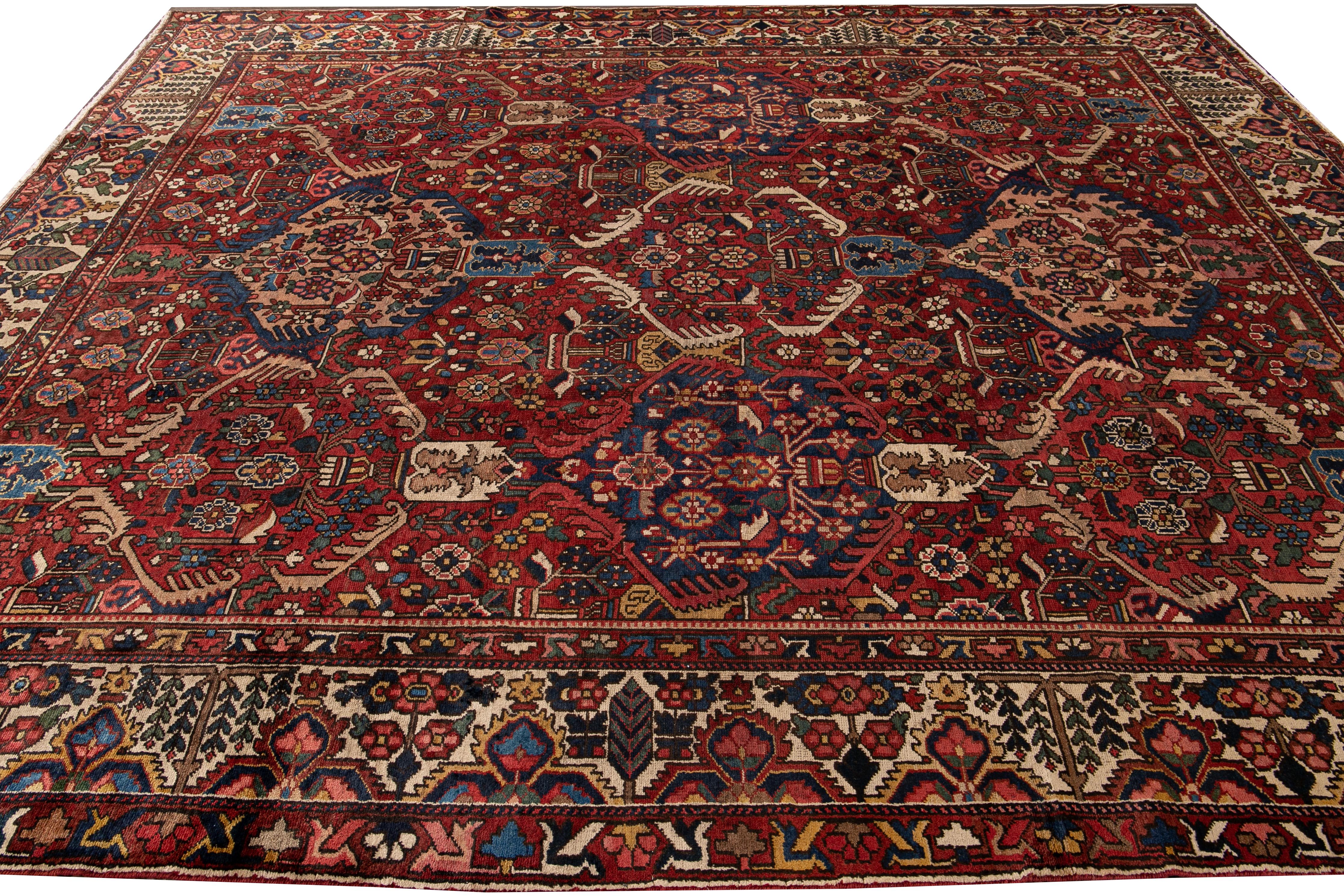 20th Century Antique Bakhtiari Persian Handmade Red Floral Wool Rug For Sale