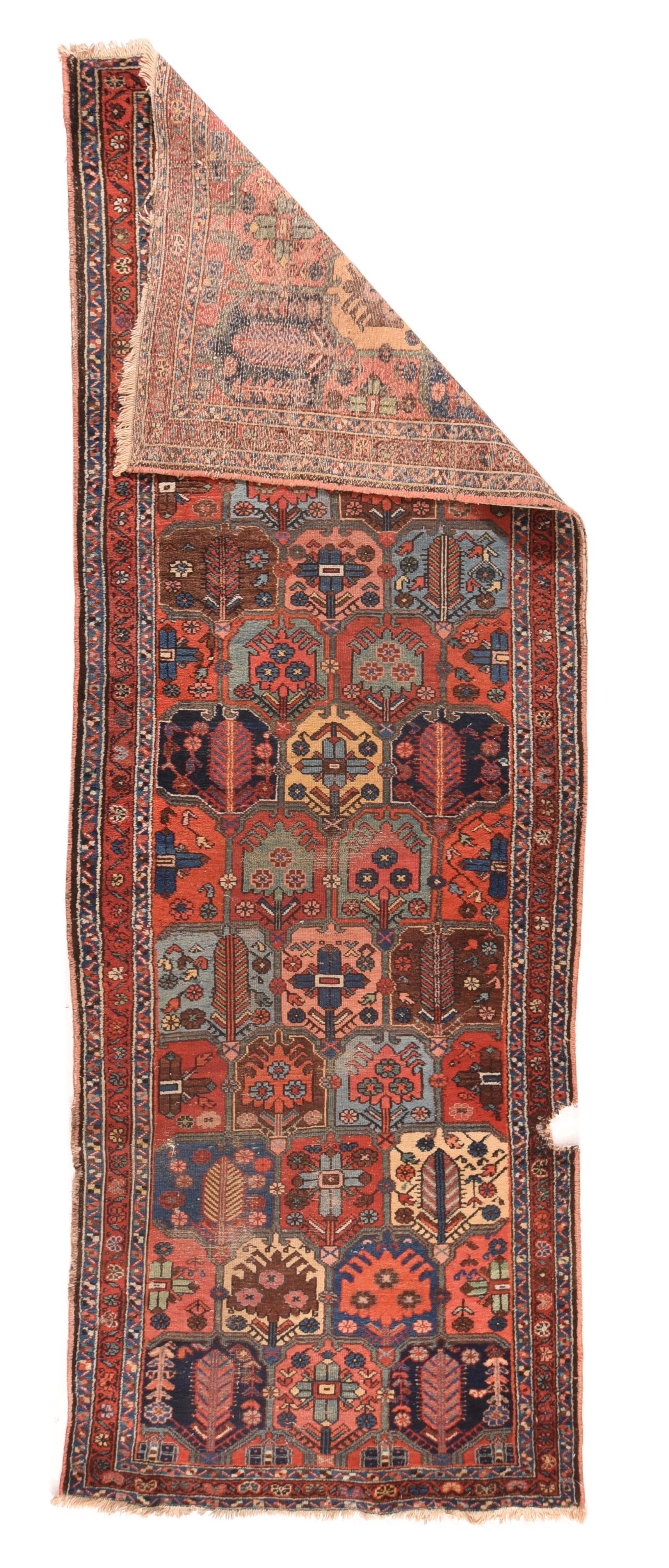 Antique Bakhtiari rug measures: 3'7'' x 10'3''.