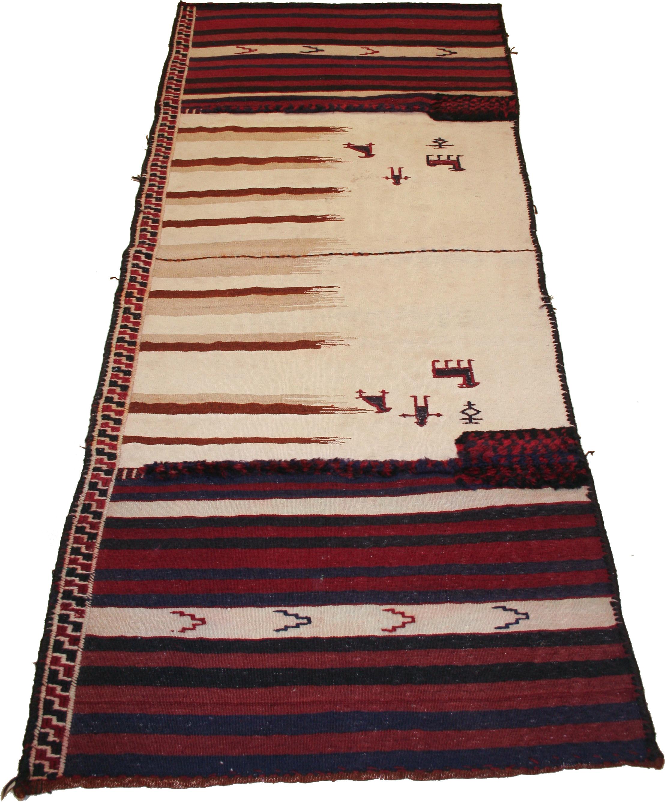 Le tacheh sono borse di lana utilizzate dai nomadi della tribù dei Bakhtiari. Queste erano utilizzate principalmente per lo stoccaggio e il trasporto del grano. Questo esempio completo e aperto ci permette di apprezzare le varie tecniche di