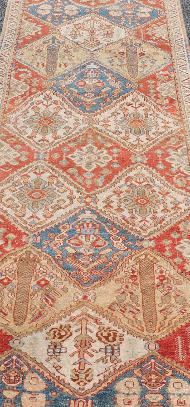 Antique Bakhtiari Persian Wide Runner in Garden Design by Keivan Woven Arts

Measures 3'7 x 11'7 

This remarkable Bakhtiari runner embodies the rich weaving tradition of its region. Characterized by intricate patterns in warm shades. Traditional