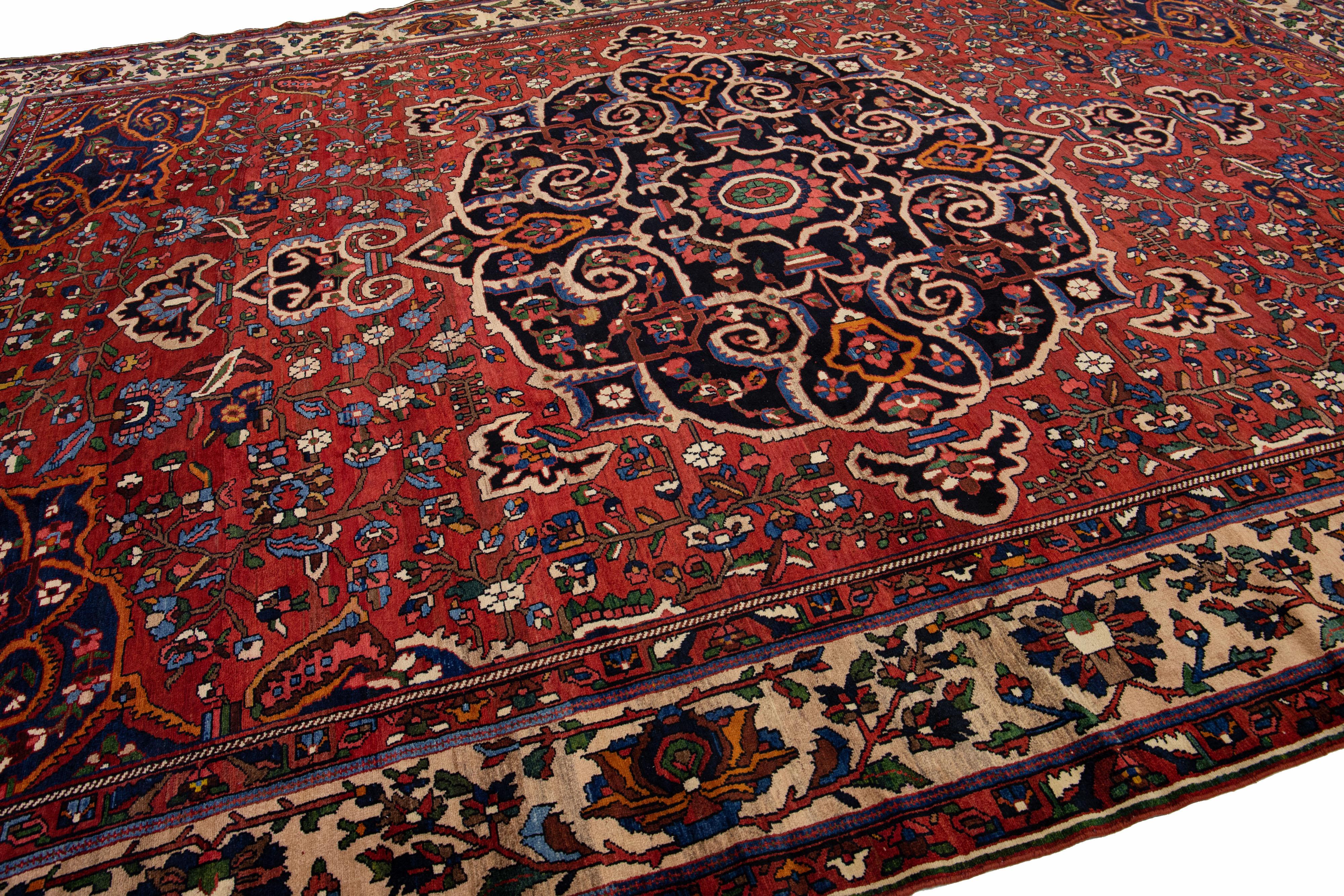 Persian 20th Century Red Handmade Bakhtiari Wool Rug With Rosette Motif  For Sale