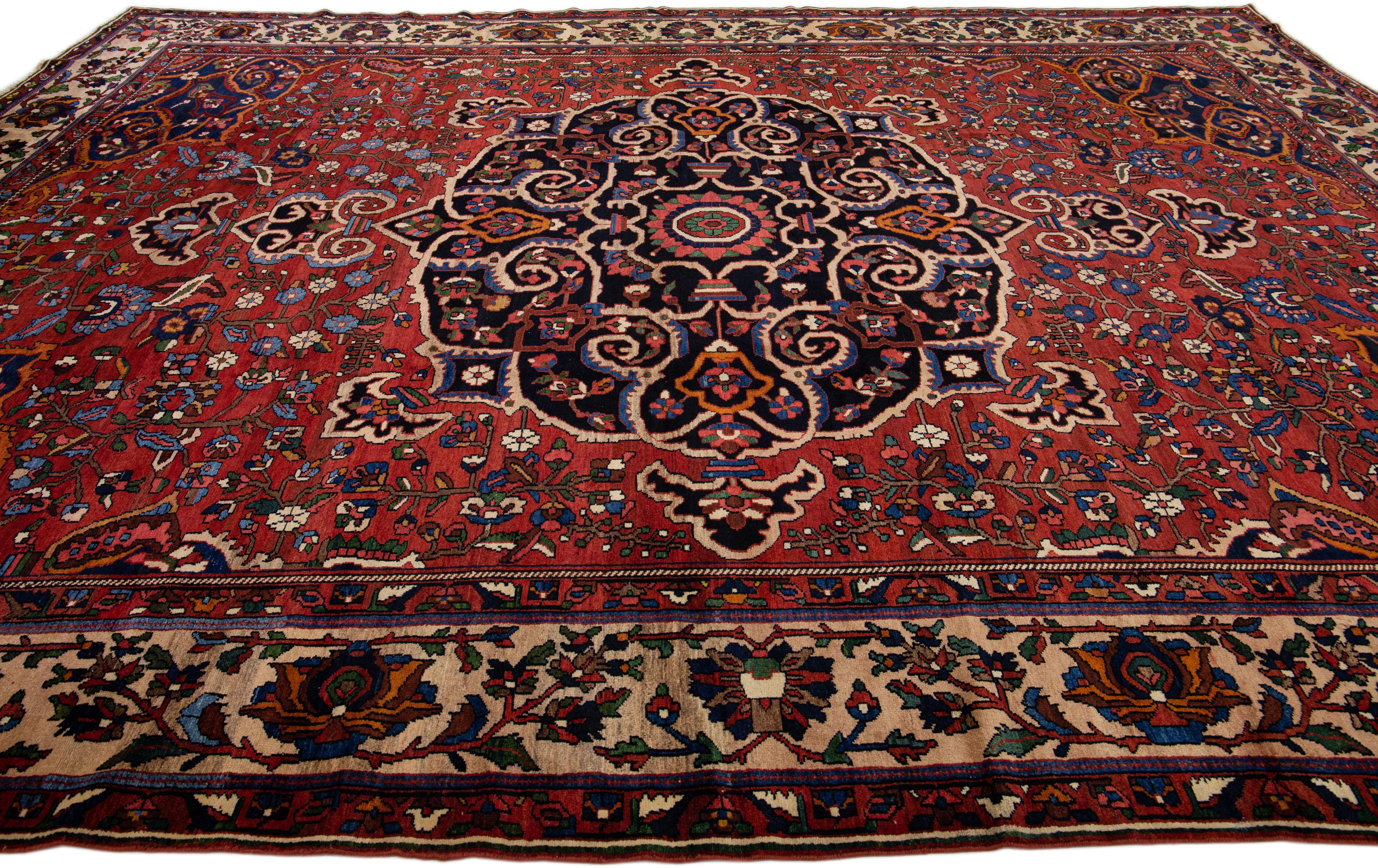 Hand-Knotted 20th Century Red Handmade Bakhtiari Wool Rug With Rosette Motif  For Sale