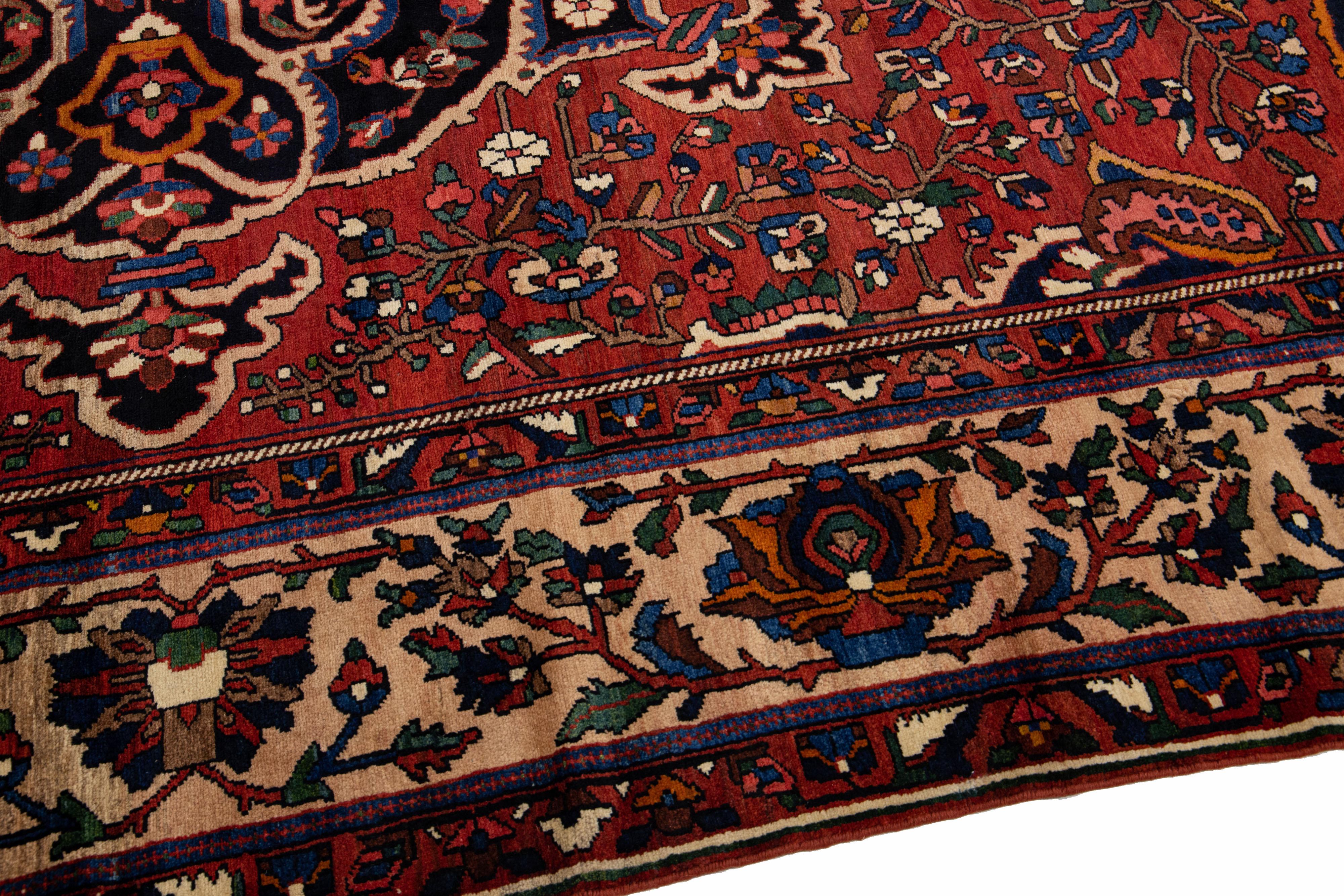 20th Century Red Handmade Bakhtiari Wool Rug With Rosette Motif  In Good Condition For Sale In Norwalk, CT