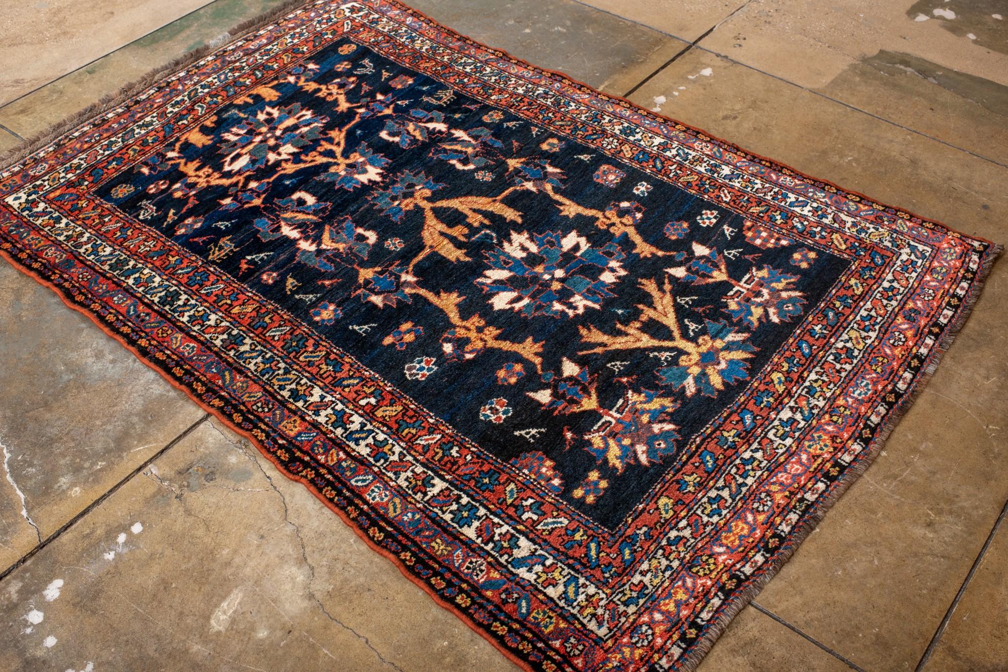 Wool Antique Baktiary Rug with Floral Design For Sale