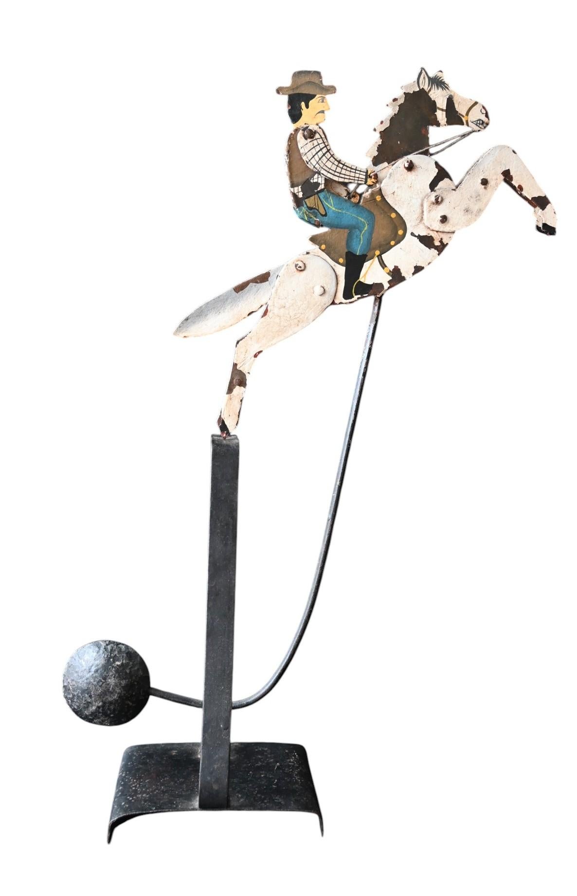 Hand-Painted Antique balance toy Galloping Cowboy Moving , handpainted forged iron, 19th C. For Sale
