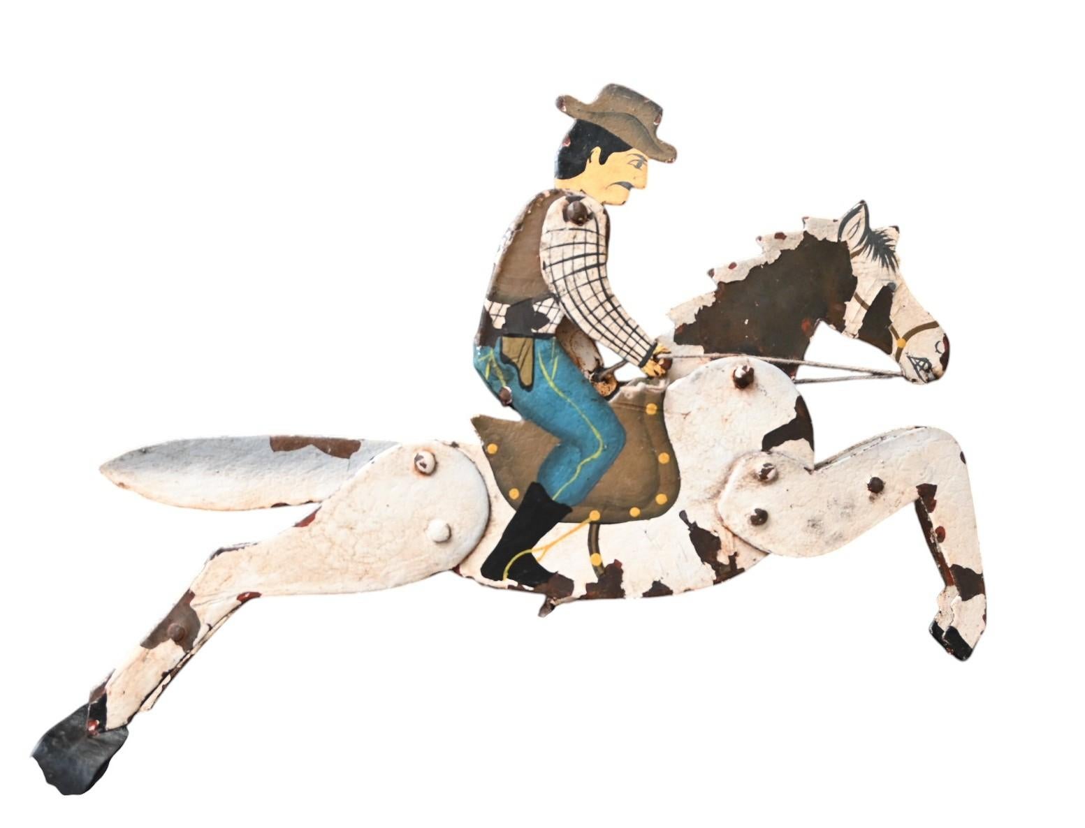 Antique balance toy Galloping Cowboy Moving , handpainted forged iron, 19th C. In Good Condition For Sale In Bilzen, BE