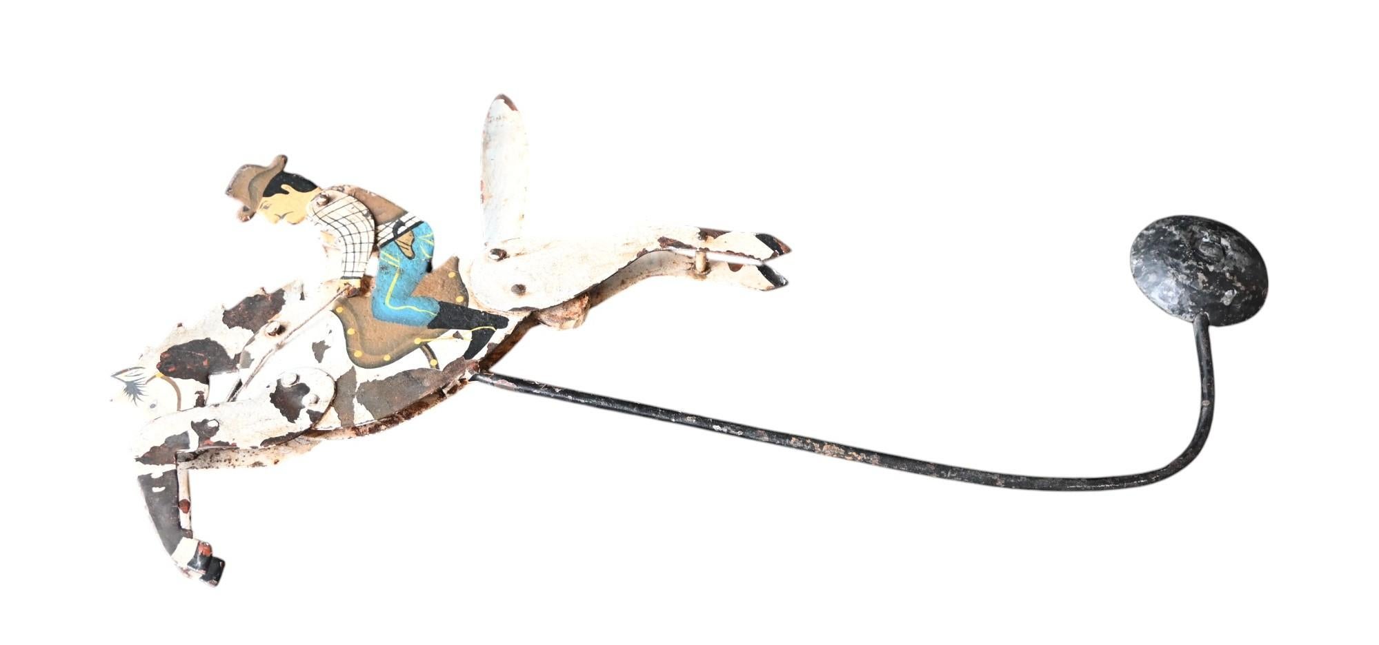 Antique balance toy Galloping Cowboy Moving , handpainted forged iron, 19th C. For Sale 2
