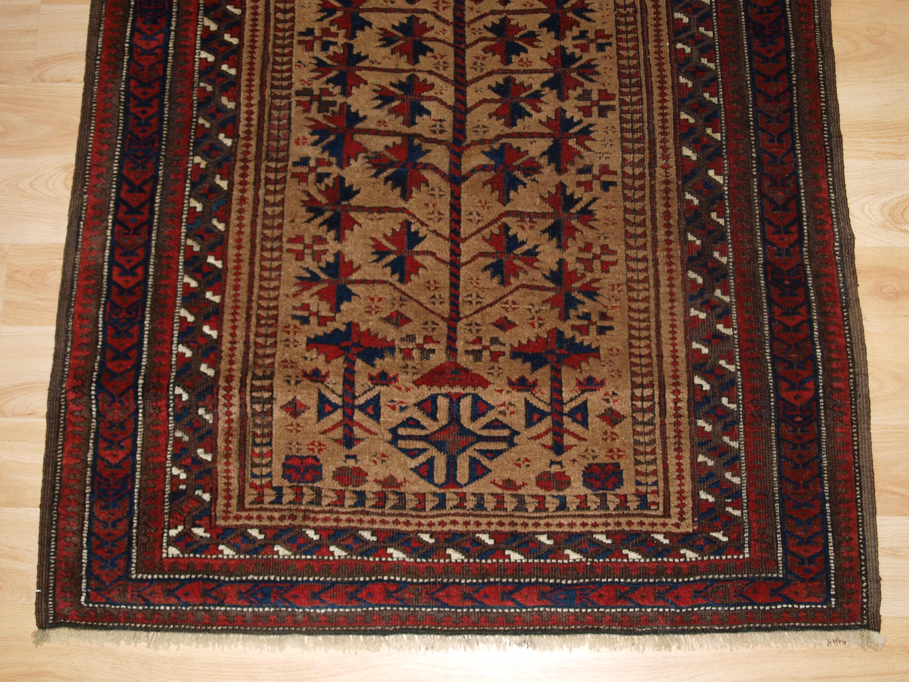 Caucasian Antique Baluch camel ground prayer rug, late 19th century. For Sale