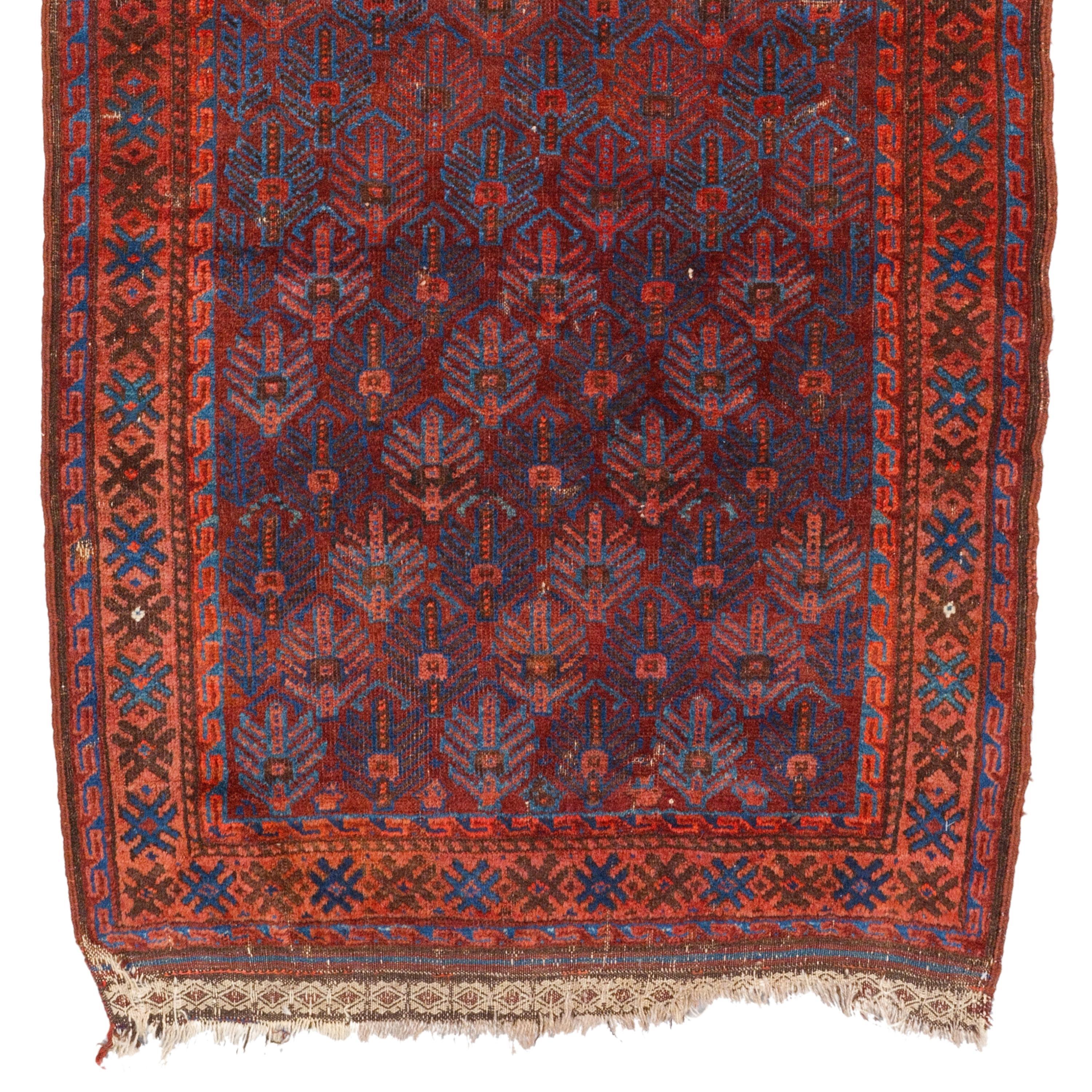 19th Century Turkmen Baluch Prayer Rug  Antique Rug
Size 95 x 140  cm (3,11x4,59 In)

This Turkmen Baluch carpet is a work of art woven in Turkmenistan in the 19th century. This carpet, dominated by dark red color, has geometric patterns enriched