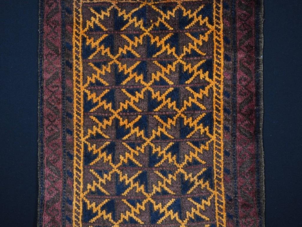 Antique Baluch pushti bag face with lotus leaf lattice design
Circa 1900

Pushti were used as pillows or back rests, they were filled with wool or straw through a small opening to one side This face from a pushti originates from the region of