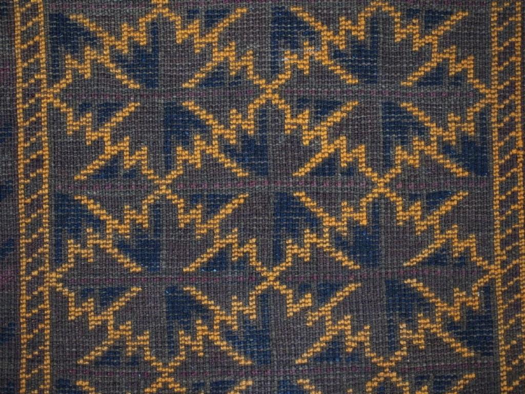 Woven Antique Baluch Pushti Face With Lotus Leaf Design, Circa 1900 For Sale