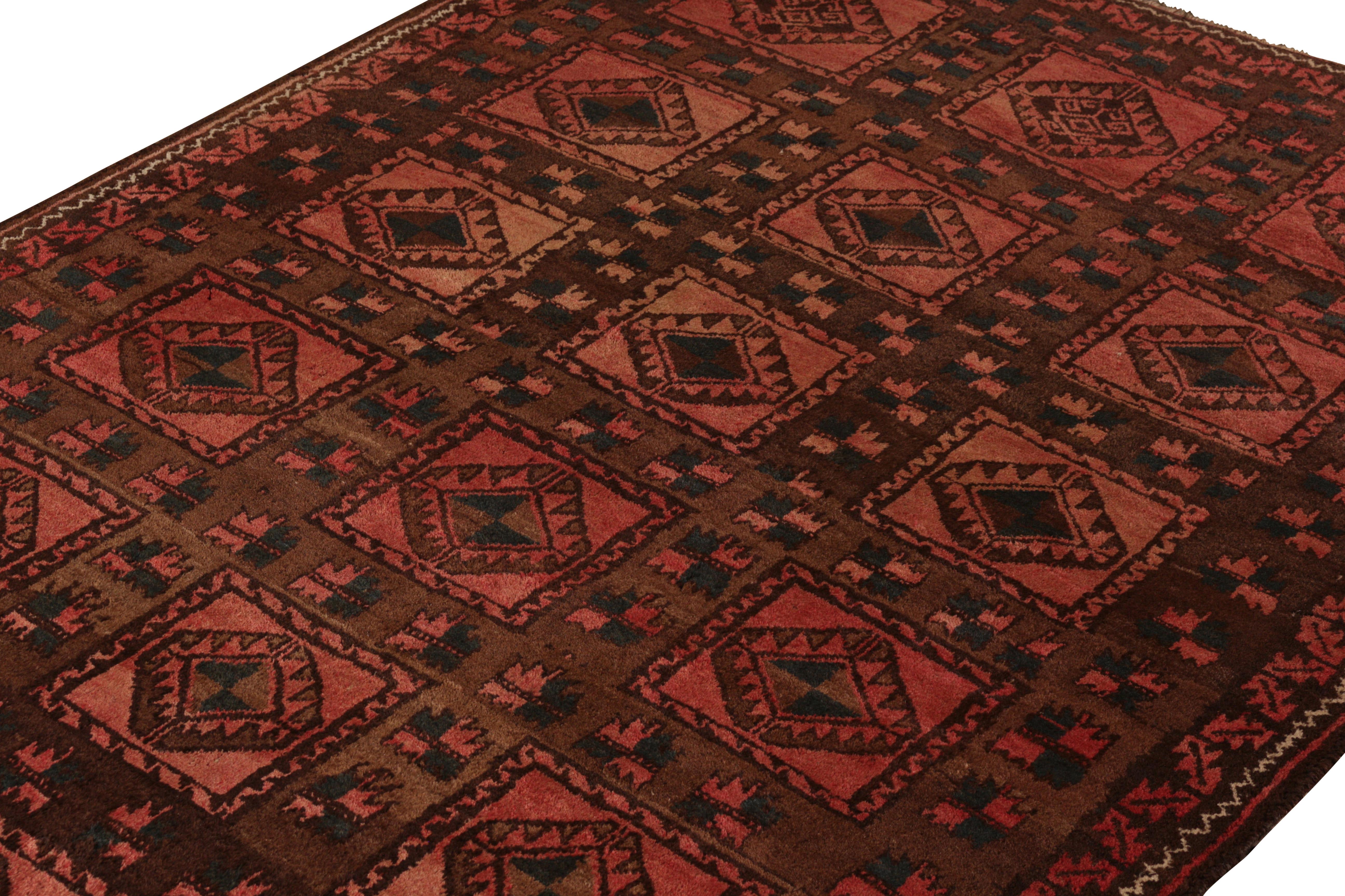 Hand-Knotted Antique Baluch Rug Brown and Pink-Red Persian Tribal Pattern by Rug & Kilim For Sale