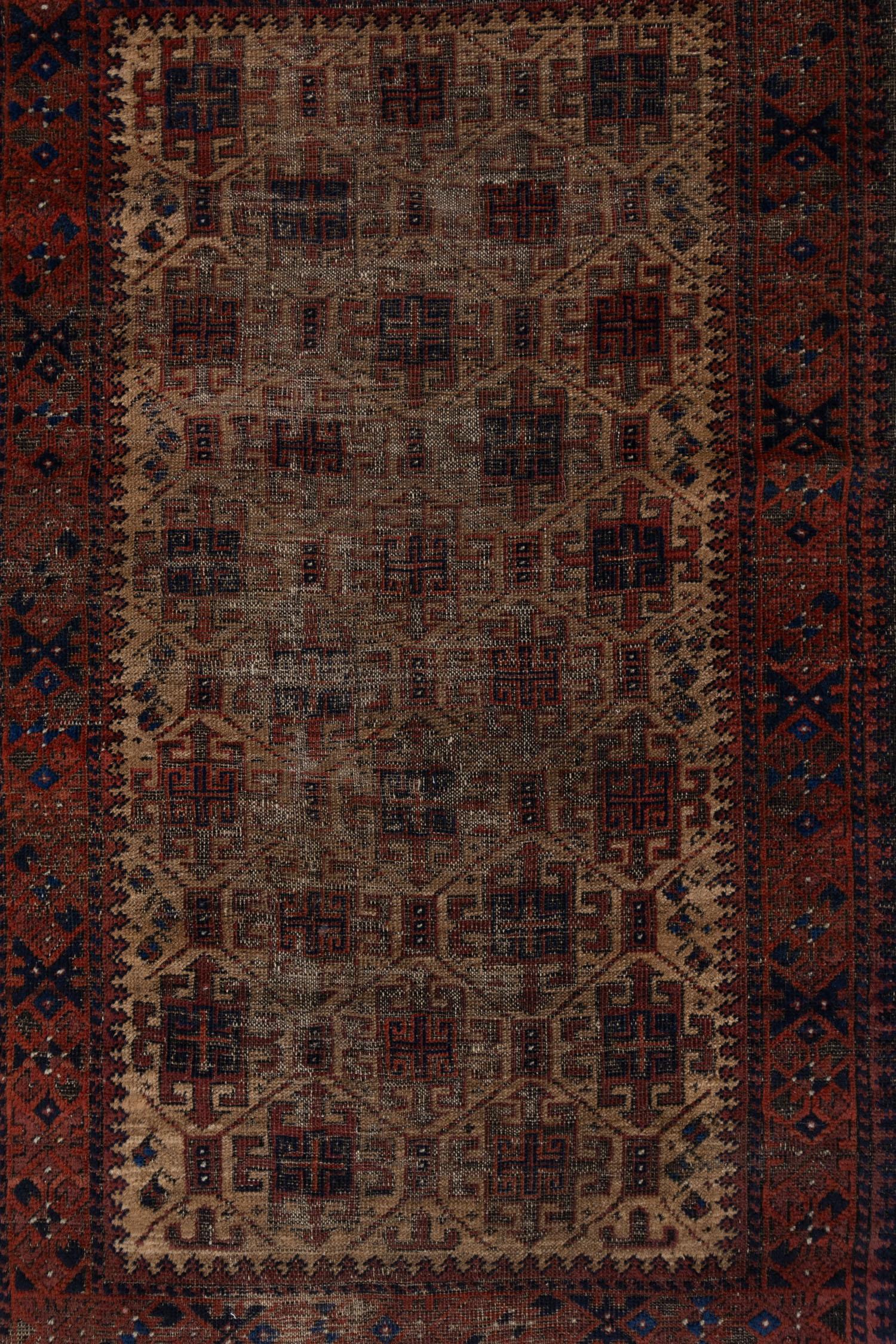 Beautiful 1880’s Persian Baluch rug with a lovely earthy colorway of terra-cotta, rust, copper and brown. This old piece has a fantastic patina and plenty of character. 