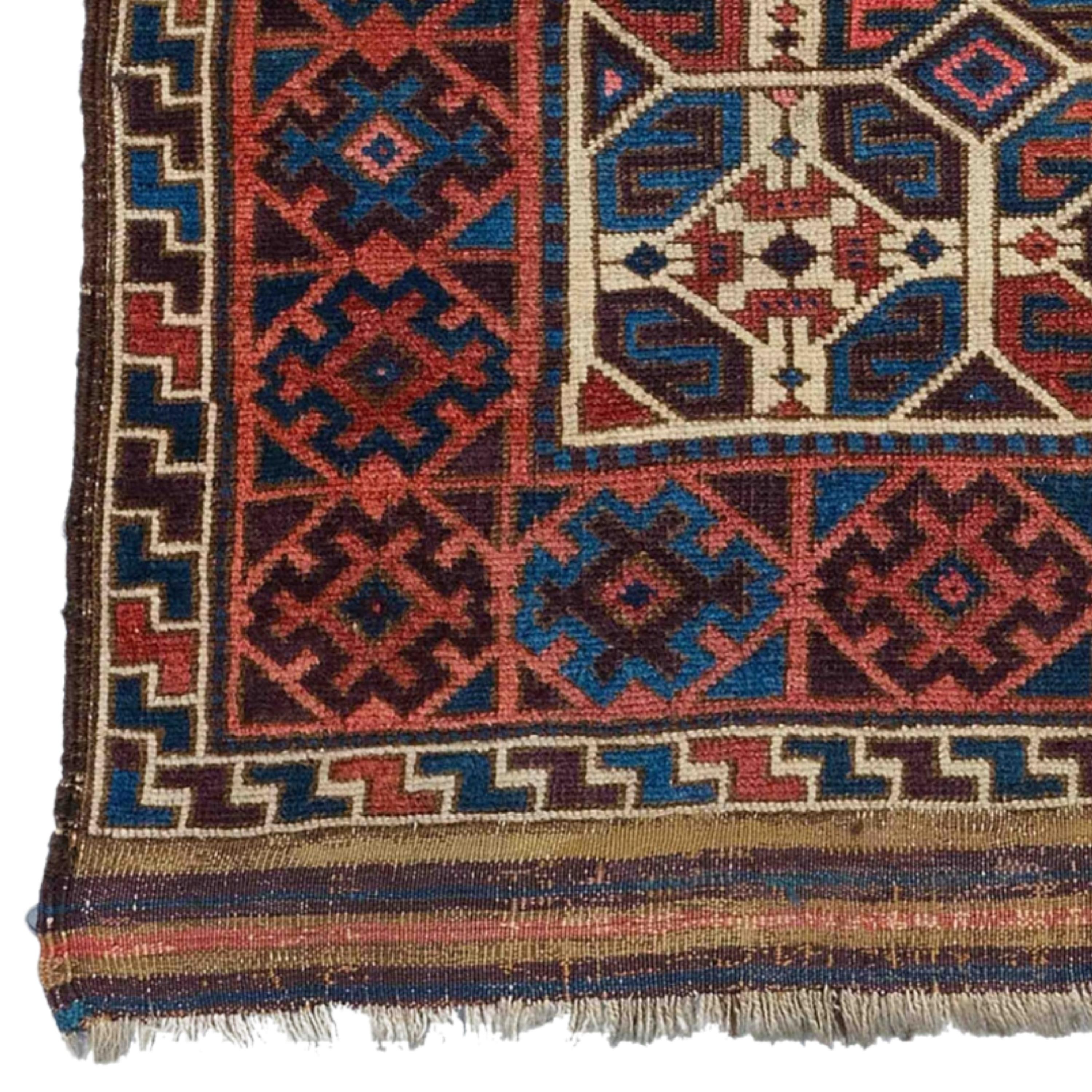Antique Baluch Rug  Antique Rug
Middle of 19th Century North East Persia, Baluch Rug

In this Baluch rug of the head and shoulders type, the border is recessed at right angles in the upper section of the field, surrounding the box-shaped arch. The