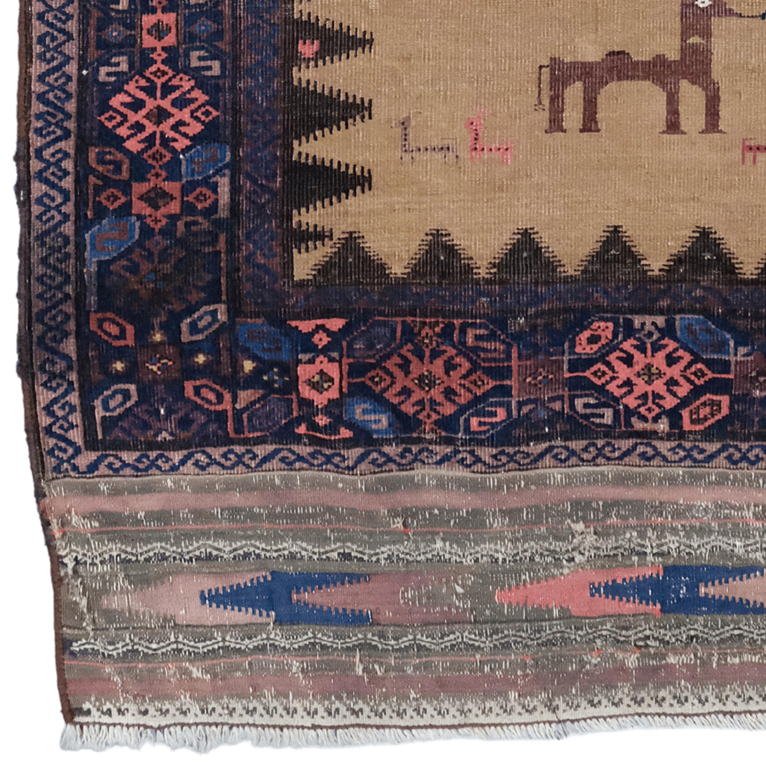 This antique Baluch carpet dates from the mid-19th century and has a rich historical and cultural heritage. At the center of the carpet are stylized human and animal figures on a light brown background. These figures reflect the artistic and