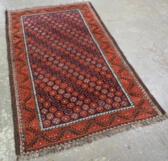 Tappeto antico Baluch con un disegno a ottagono piccolo e ripetuto, Circa Design, 1900