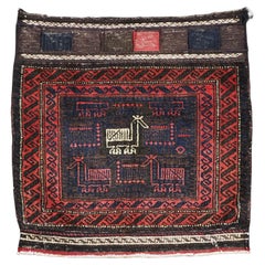 Face de sac de selle Baluch antique avec motif « oiseau ».  Circa 1900.