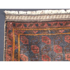 Antico volto di borsa Baluch con disegno a "mattonelle".