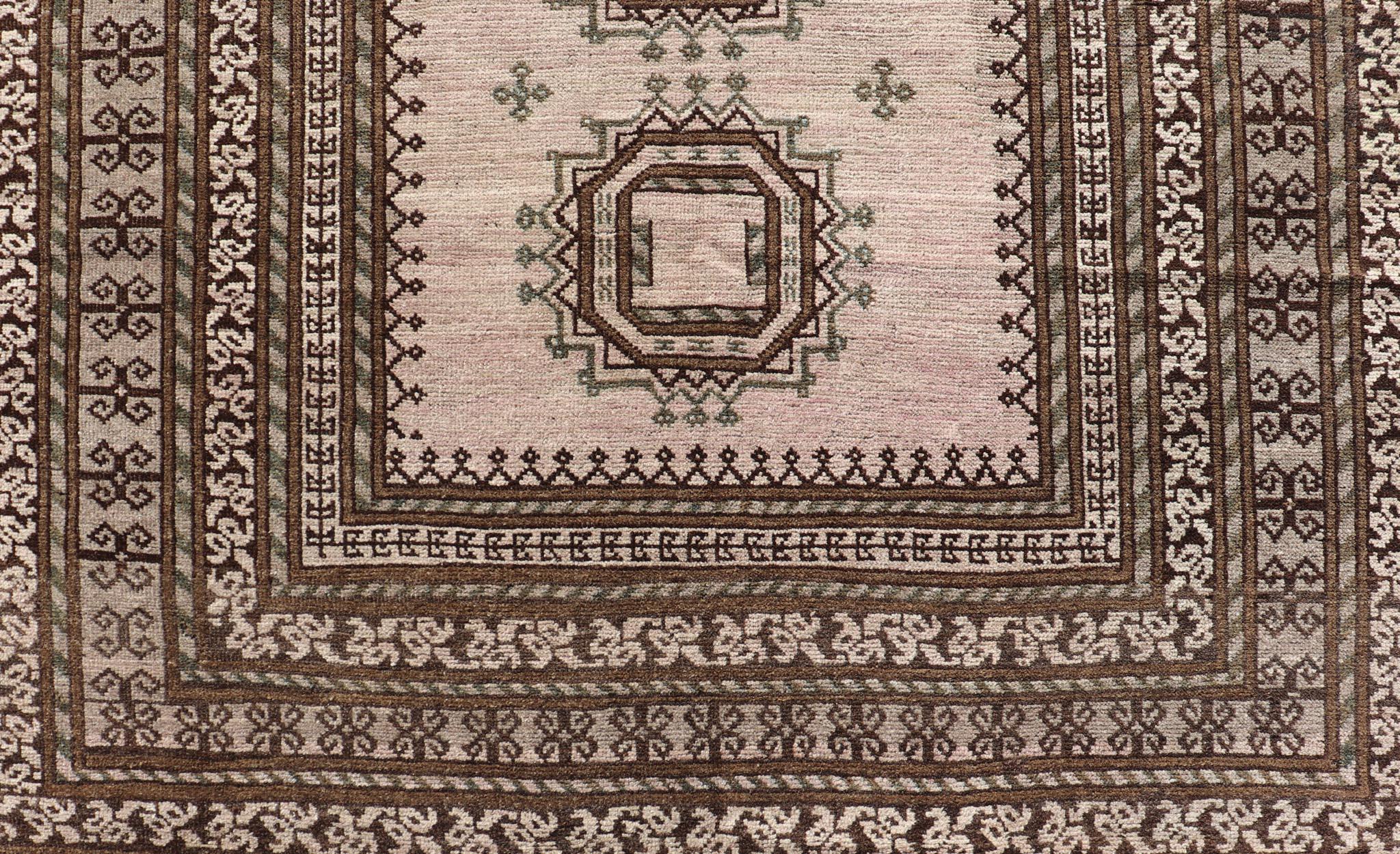 Measures: 4'2 x 6'9 
Antique Baluch Tribal Rug with All-Over Geometric Diamond Medallion Design. Keivan Woven Arts, rug EN-14681; country of origin / type: Iran / Baluch, circa 1930s.

This Antique Baluch rug has been hand-knotted and features an