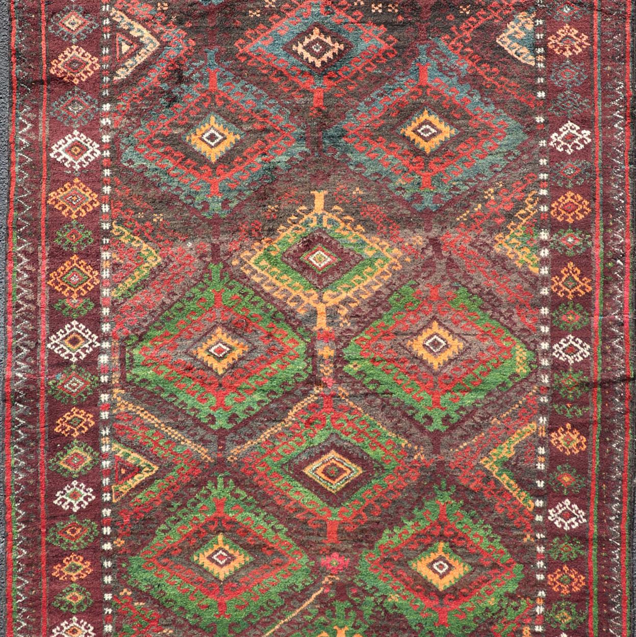 Hand-Knotted Antique Baluch Tribal Rug with All-Over Geometric in Colorful Design and Motifs  For Sale