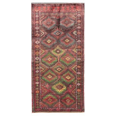 Tapis tribal baluch ancien avec motifs et motifs géométriques colorés 