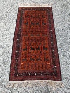Antique Baluchi Rug with deer motif, hand-knotted and natural dyed wool