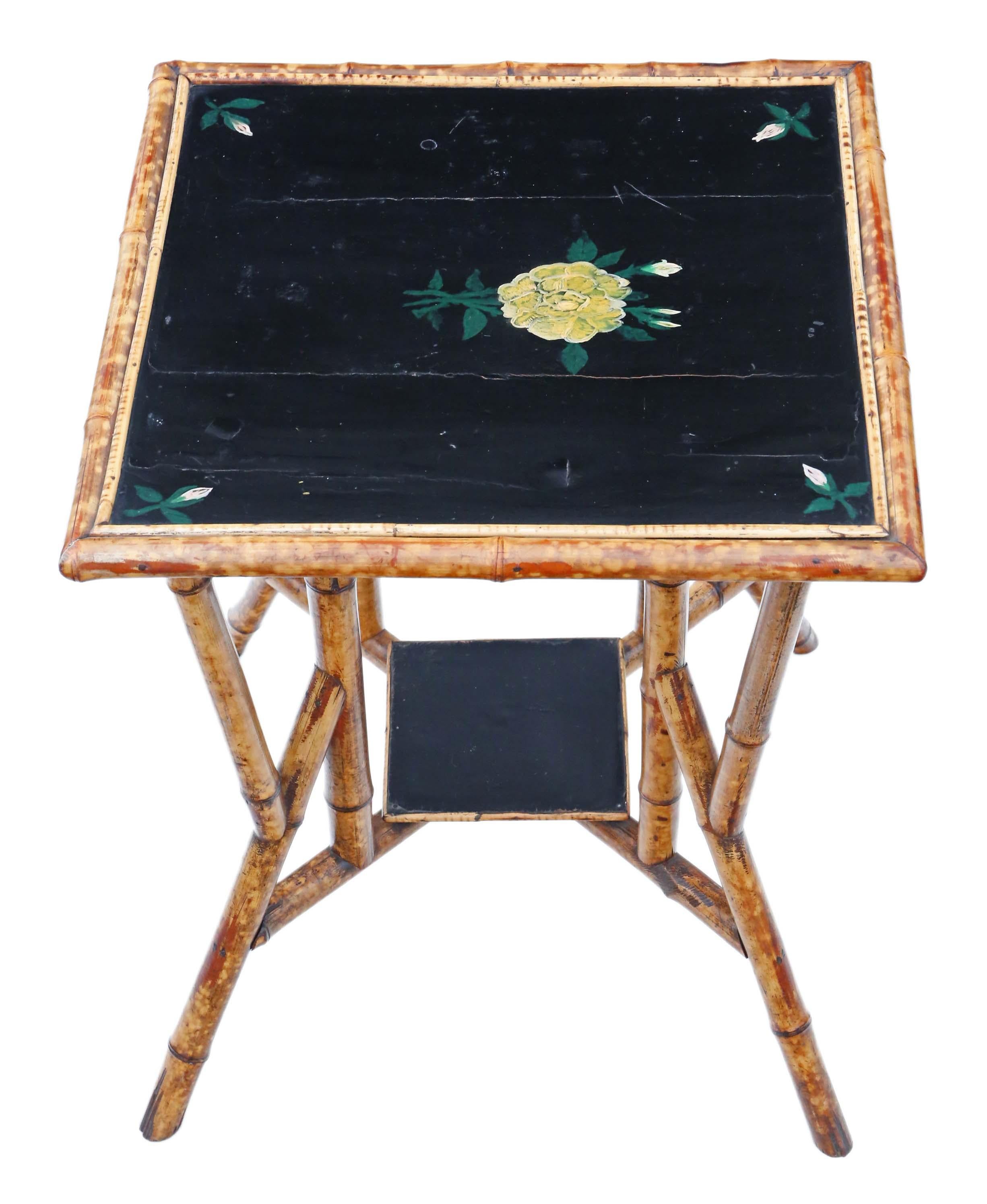 Antique quality C1900 bamboo black lacquer occasional window table.

No loose joints and no woodworm. An abundance of character and charm. A rare decorative find.

Would look great in the right location!

Overall maximum dimensions: 60cmW x