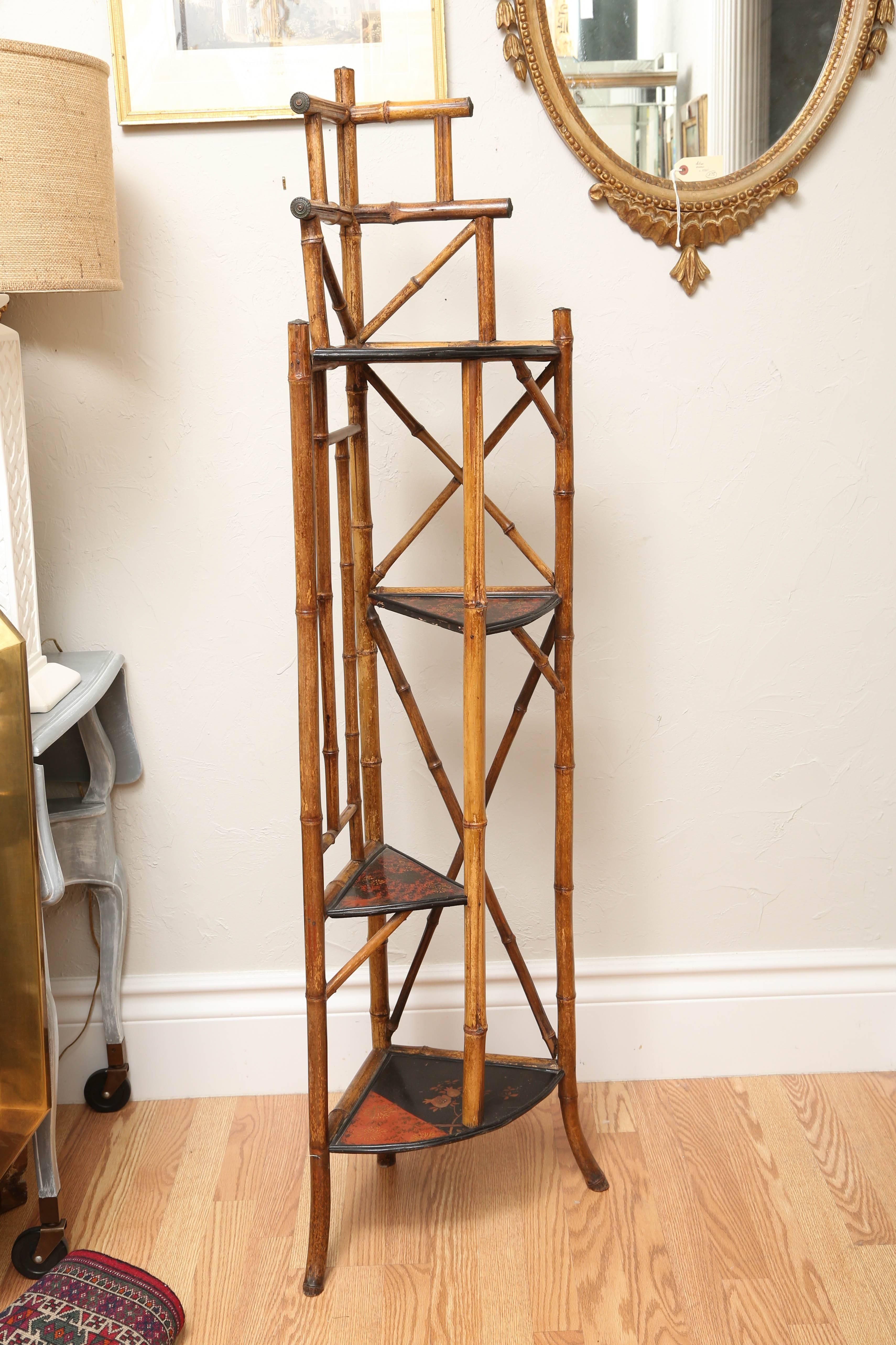 English antique bamboo corner whatnot with multiple shelves.