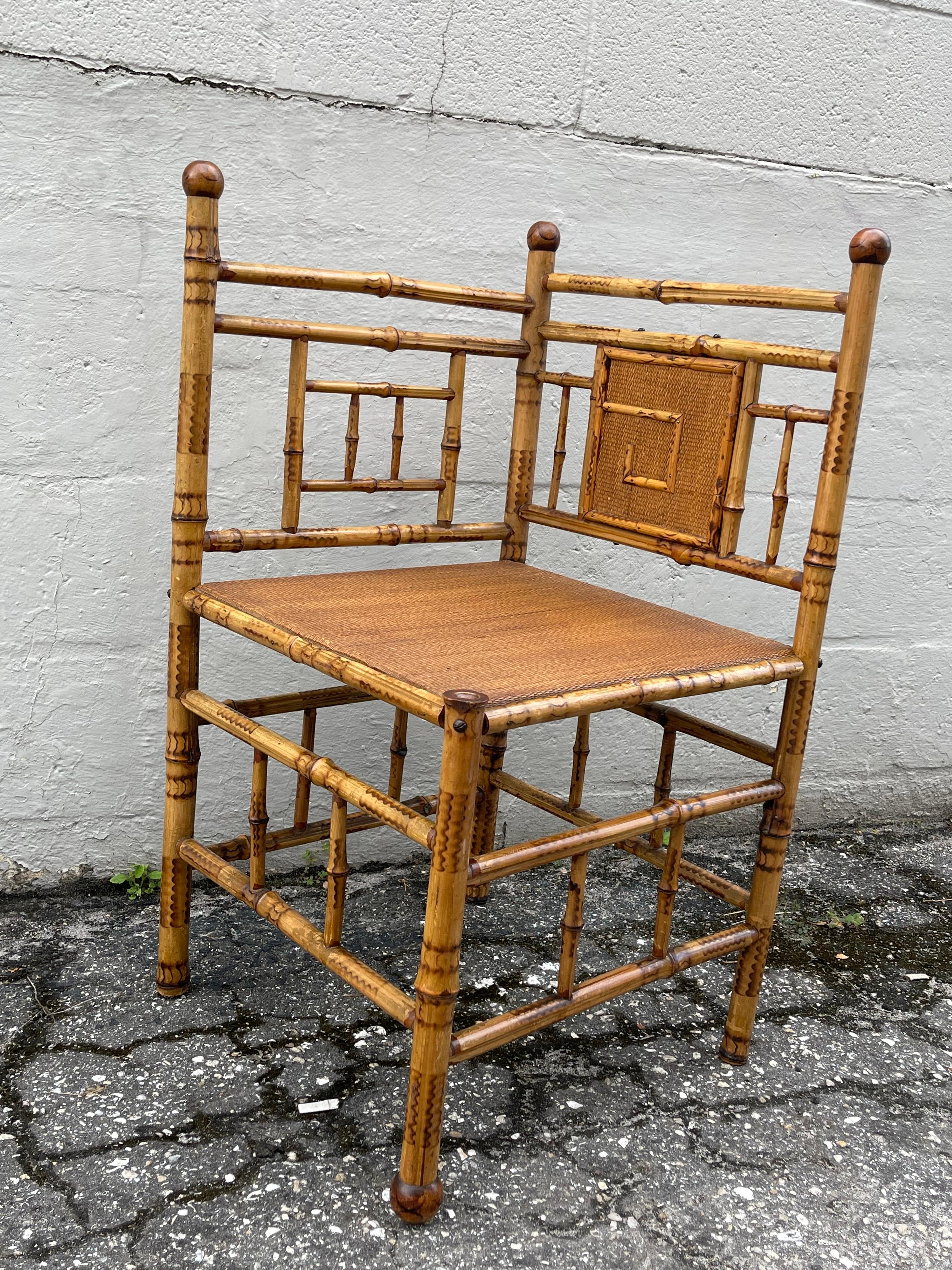 Antique English corner bamboo chair in very good original condition. Great accent piece for any room.