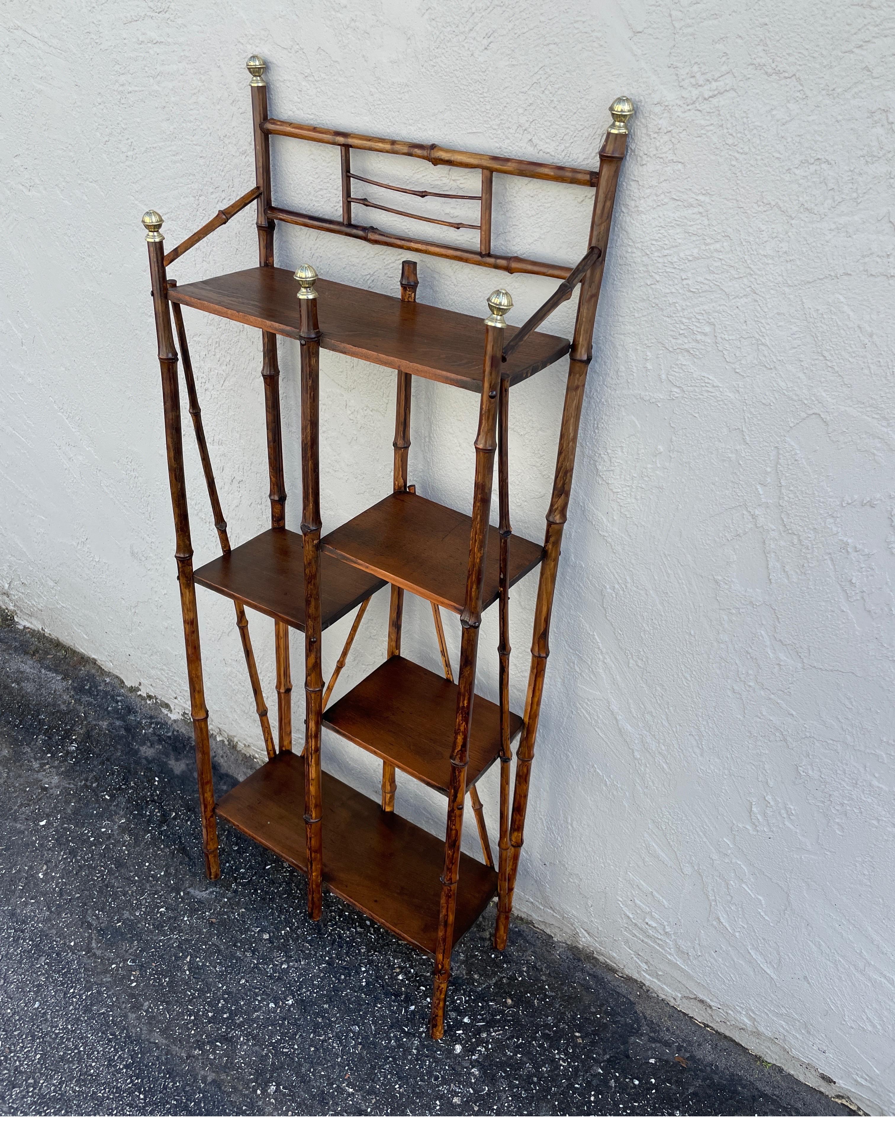 19th Century English bamboo etagere / what not. This piece is in very fine condition & will showcase your favorite pieces. Very versatile piece.