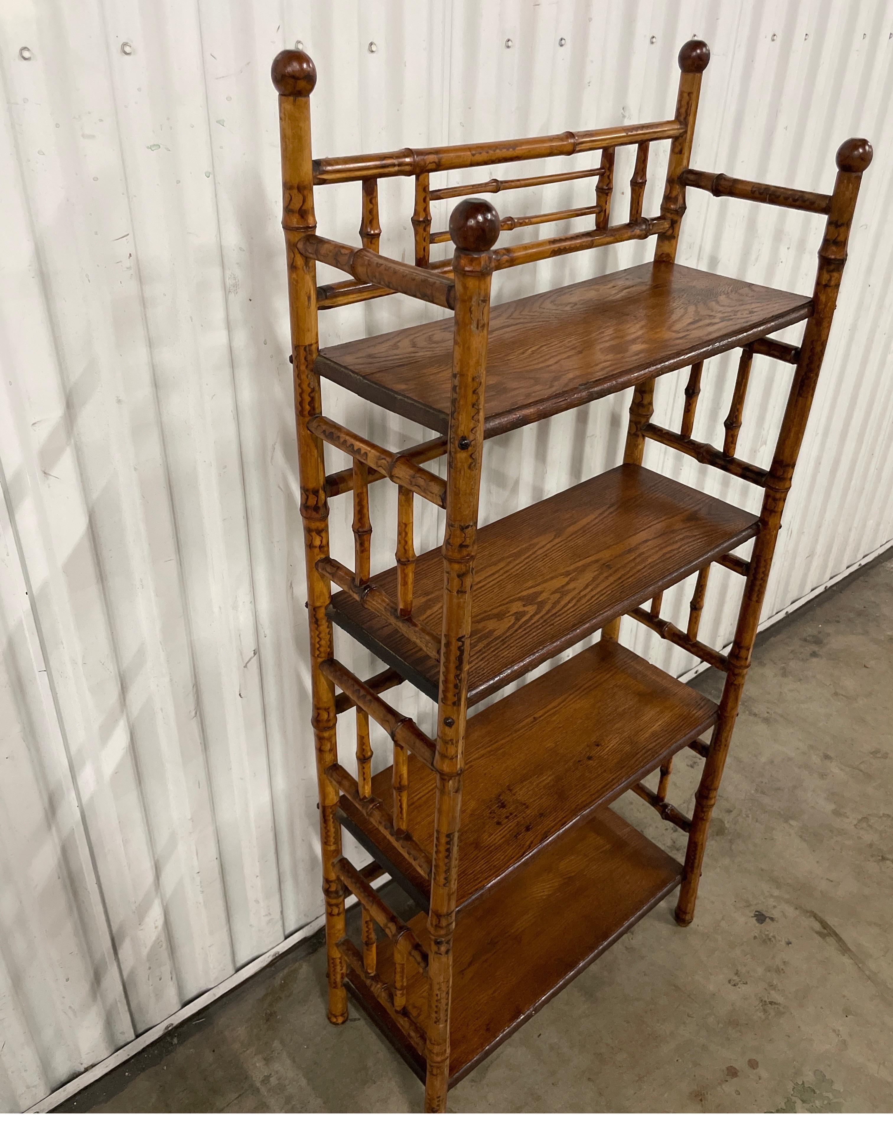 Antique English bamboo four shelf etagere. The overall height is 48