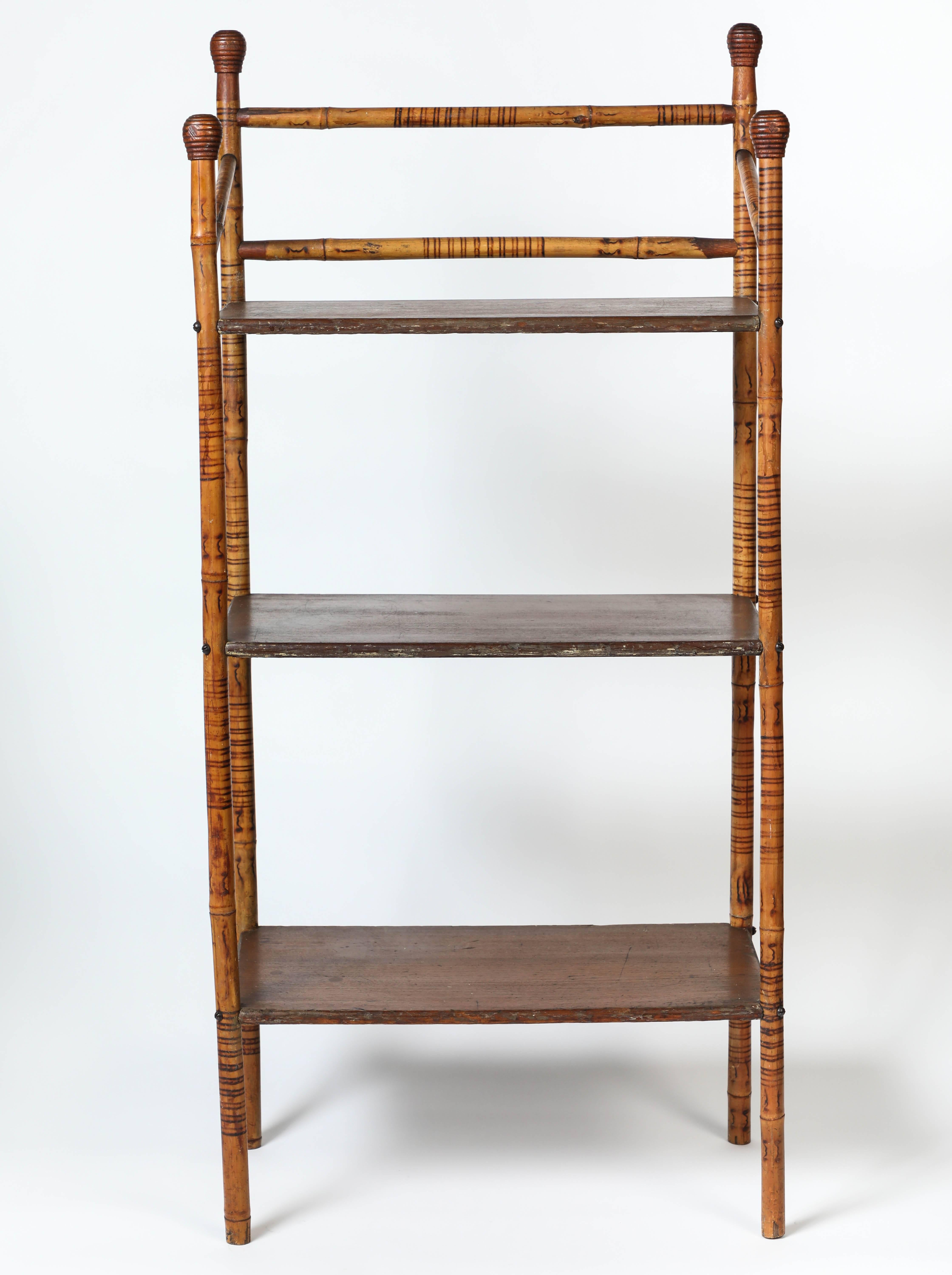 Beautiful and classic antique bamboo frame standing shelf.