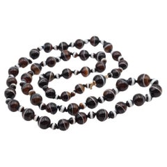 Antique banded agate necklace with its 14 karat gold clasp, ribboned agate beads
