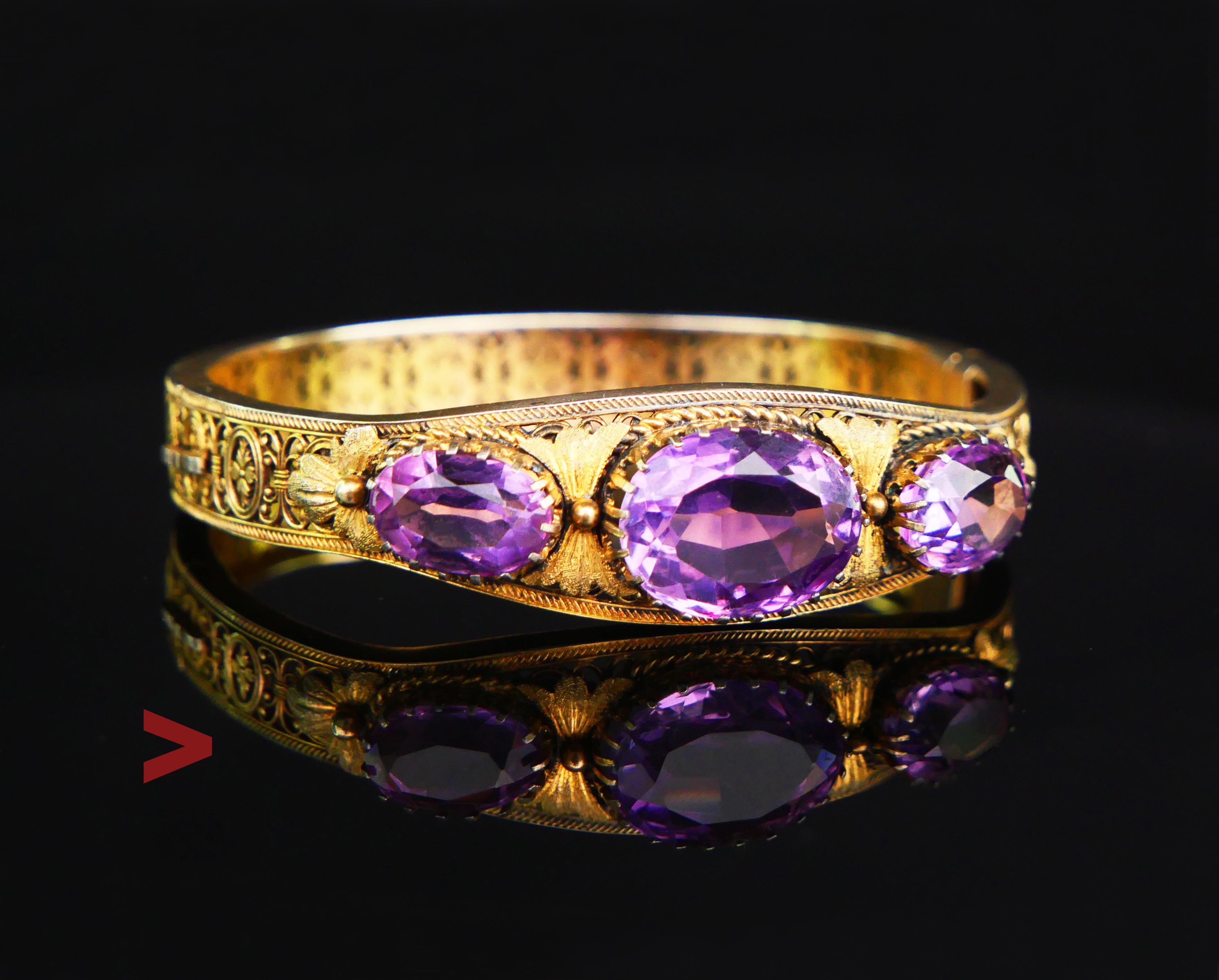 Old fine Gilt Silver European bangle bracelet of the finest quality, with openwork shoulders and secure V-lock. Oval cut natural Amethyst stones in secure claw settings. Hallmarked with Swedish customs marks used after 1912 confirming at least 830
