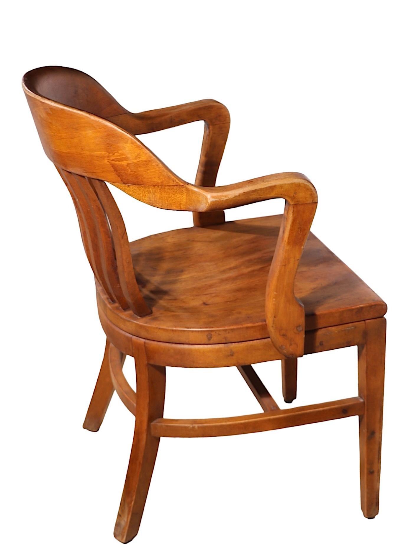Classic Bank of England, Jury, Yale Library arm chair , circa 1920/40's attributed to Gunlocke. The chair is structurally sound and sturdy, clean and ready to use, showing only light cosmetic wear, normal and consistent with age. 