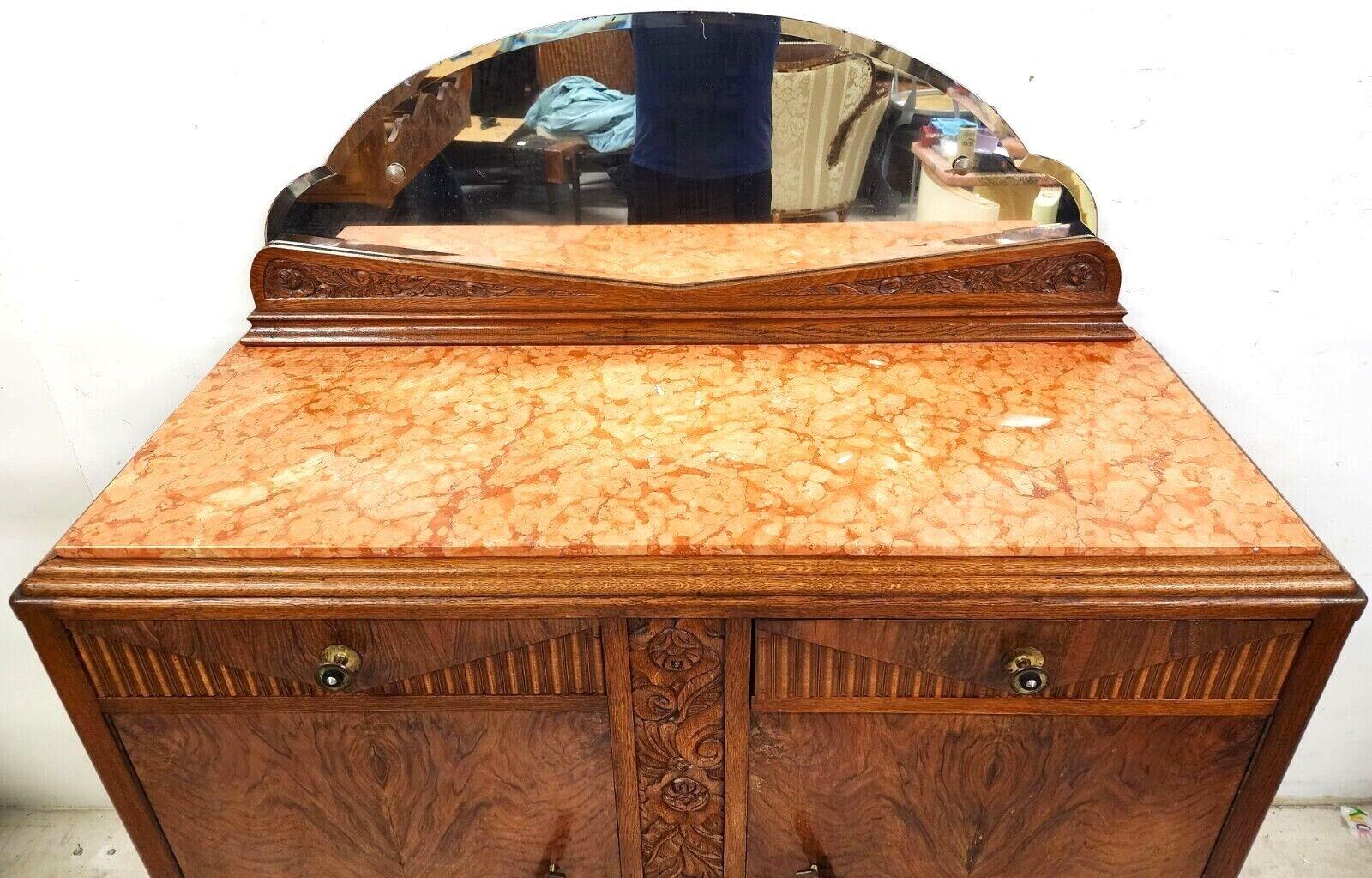 Offering One Of Our Recent Palm Beach Estate Fine Furniture Acquisitions Of A
Antique 1920s Art Deco Bar Cabinet Peach Marble Top and Amboyna Burl
Featuring a beautiful piece of antique peach marble top, lots of hand-carved accents, and 2 working
