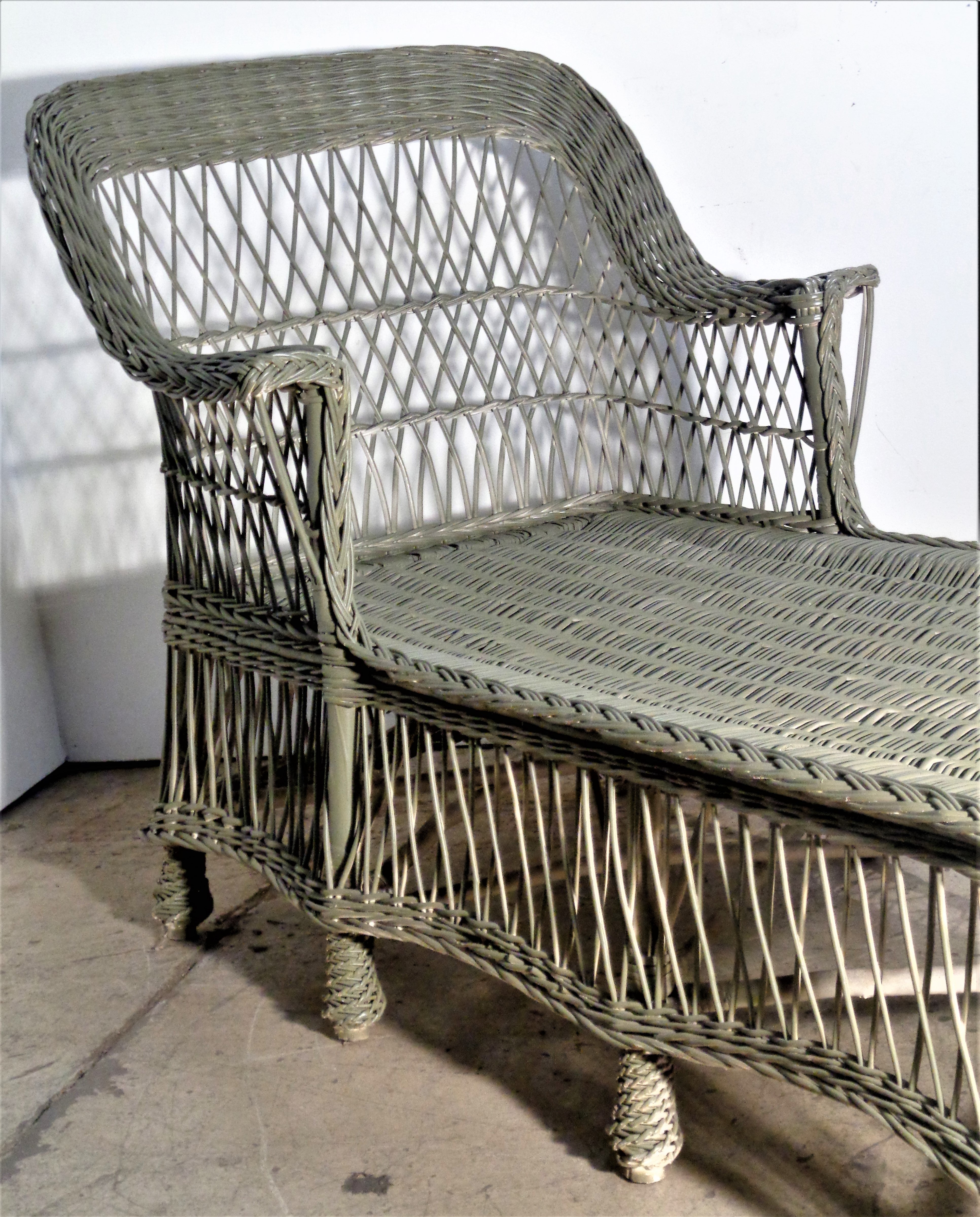 Antique Bar Harbor sage green painted woven wicker willow chaise lounge with wood framework and intricately woven feet. Circa 1920-1940's. Look at all pictures and read condition report in comment section. 
**** Delivery can be arranged from