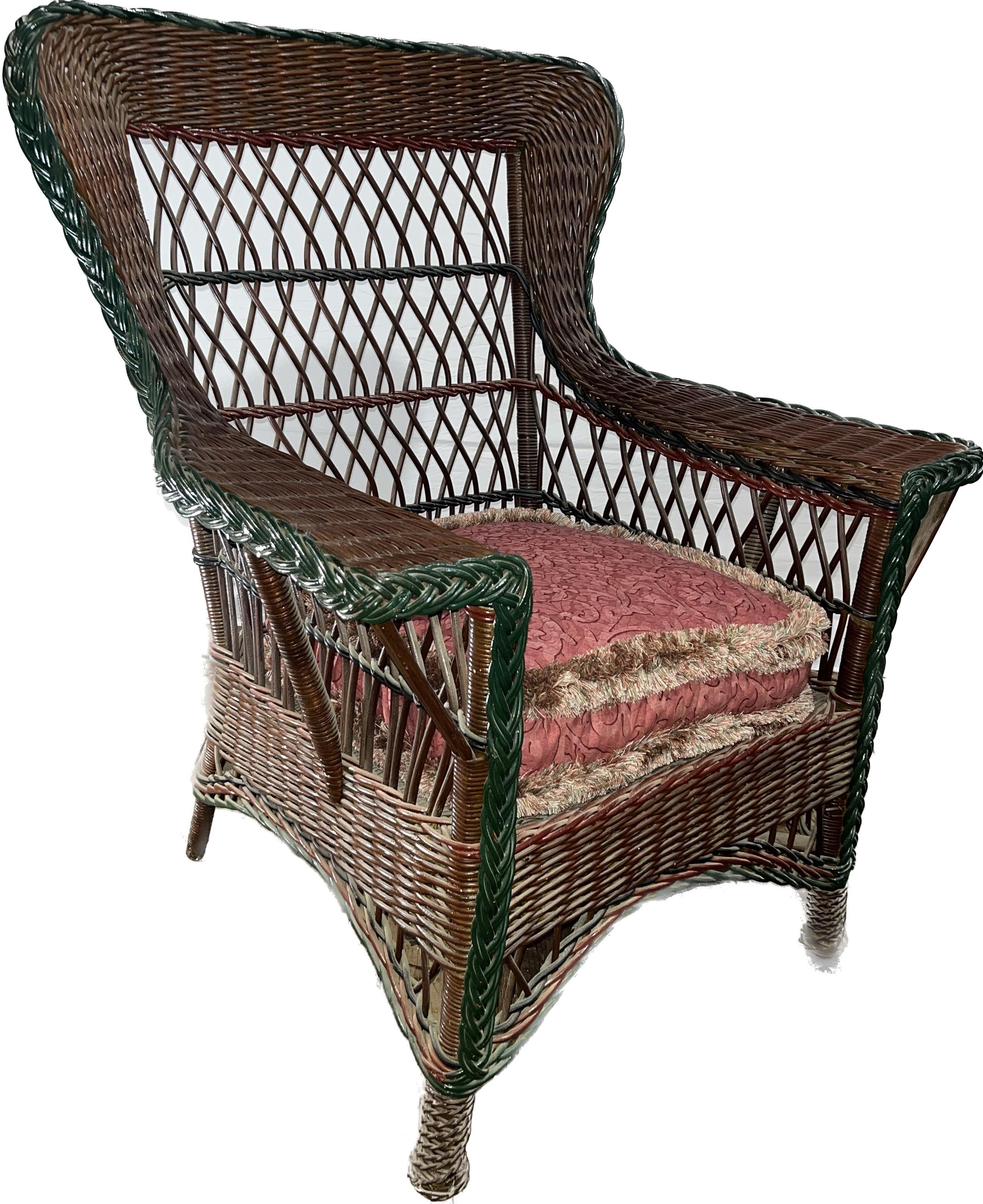 American Antique Bar Harbor Style Wicker Wing Chair in Natural Finish with Green Trim For Sale