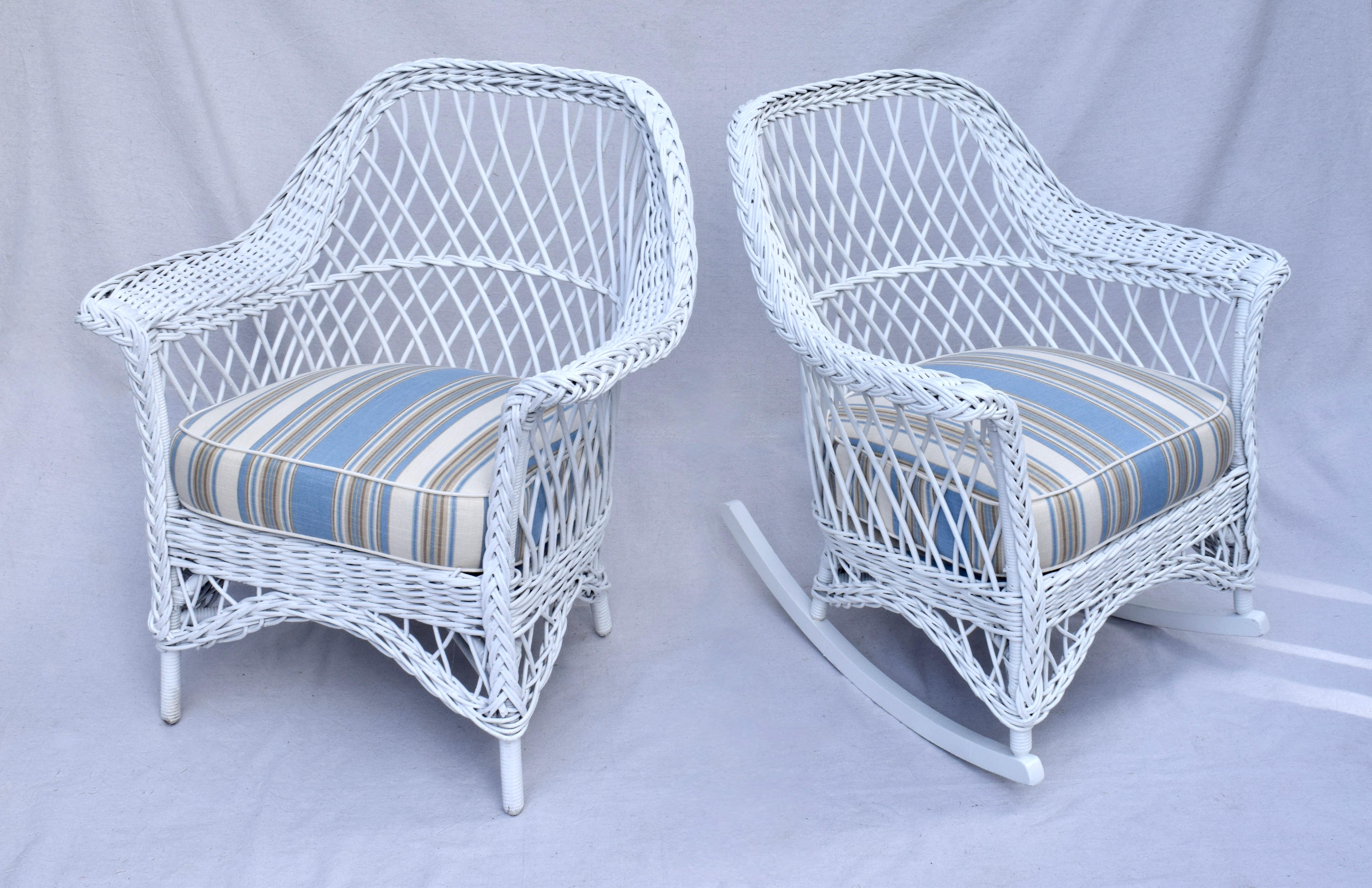 Beautifully preserved early 20th c. American willow and reed Bar Harbor porch chair & matching rocker, newly painted with new custom cushions upholstered in blue & white coastal stripe cotton linen. Seats: 18