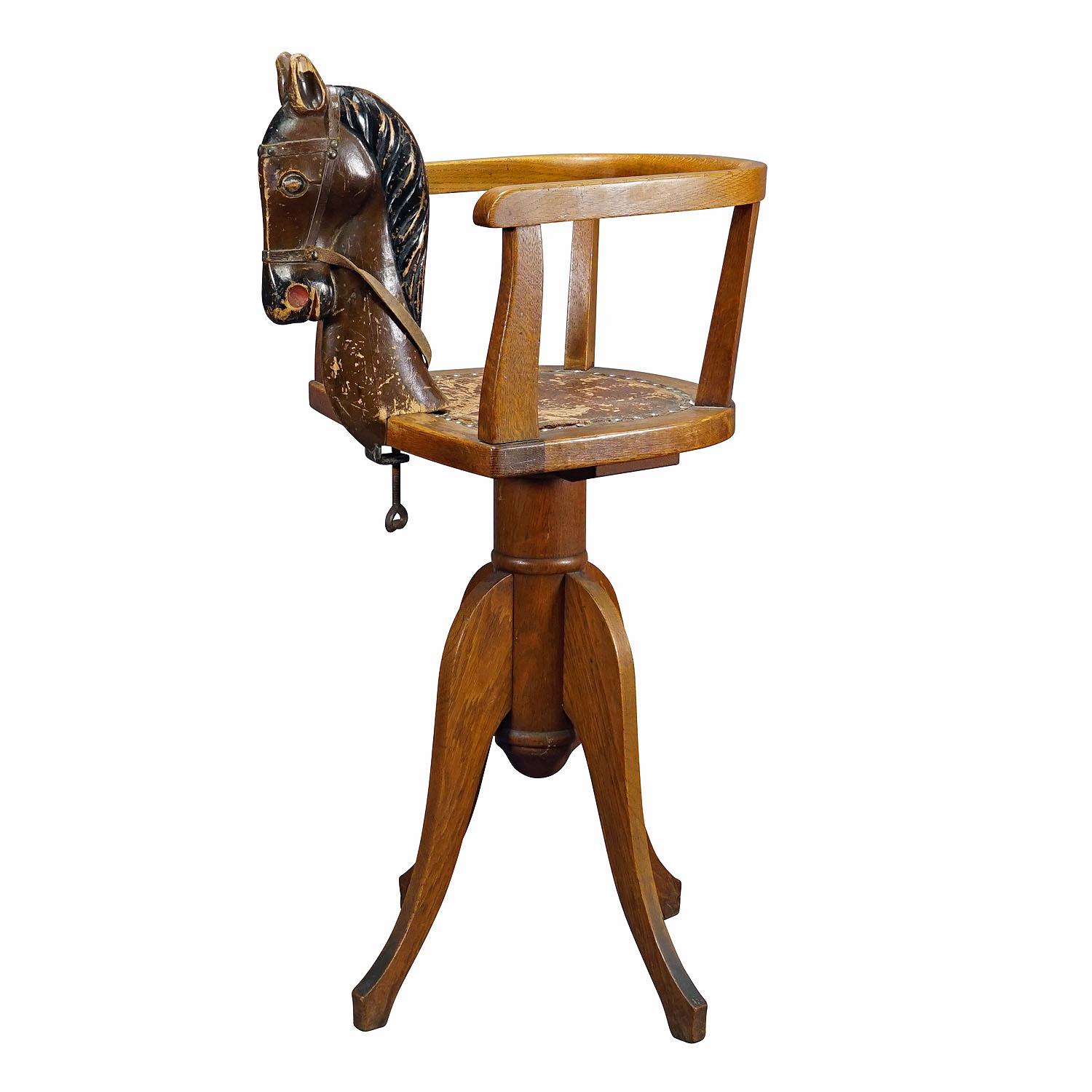 Antique Barber Chair for Children, Germany ca. 1920s

An antique barber shop children chair. With rotatable height adjustment and a wooden horse head which is attached to the front of  the seat. Good unrestored condition, height adjustment in