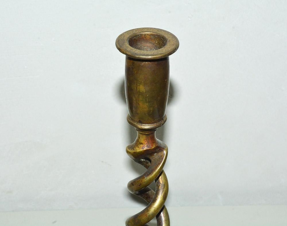 19th C. English Victorian solid brass barley twist candlestick with round circular  base of heavy construction and wonderful aged patina.
Candle holder