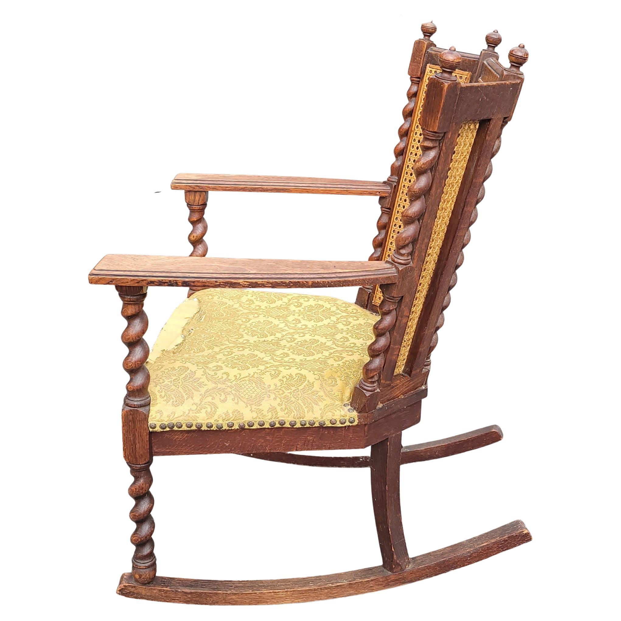 Edwardian Antique Barley Twist Mission Oak 3-Panel Caned Back Rocking Chair, C. 1900s