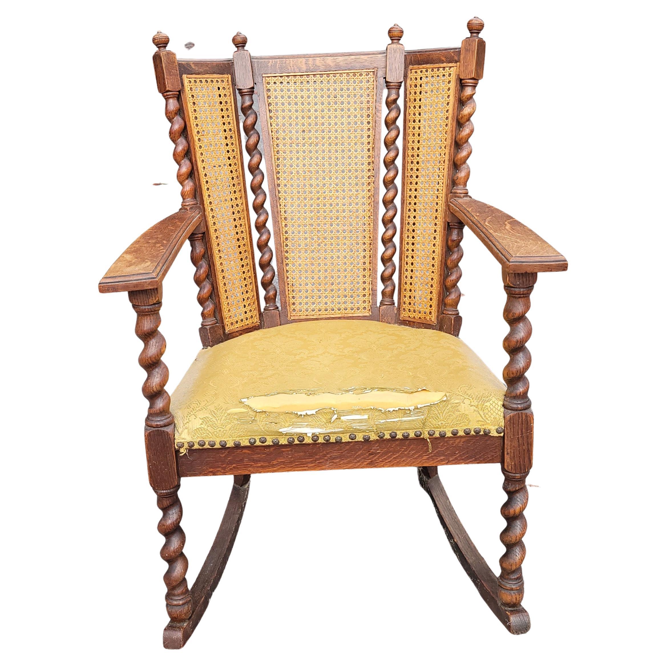 Antique Barley Twist Mission Oak 3-Panel Caned Back Rocking Chair, C. 1900s