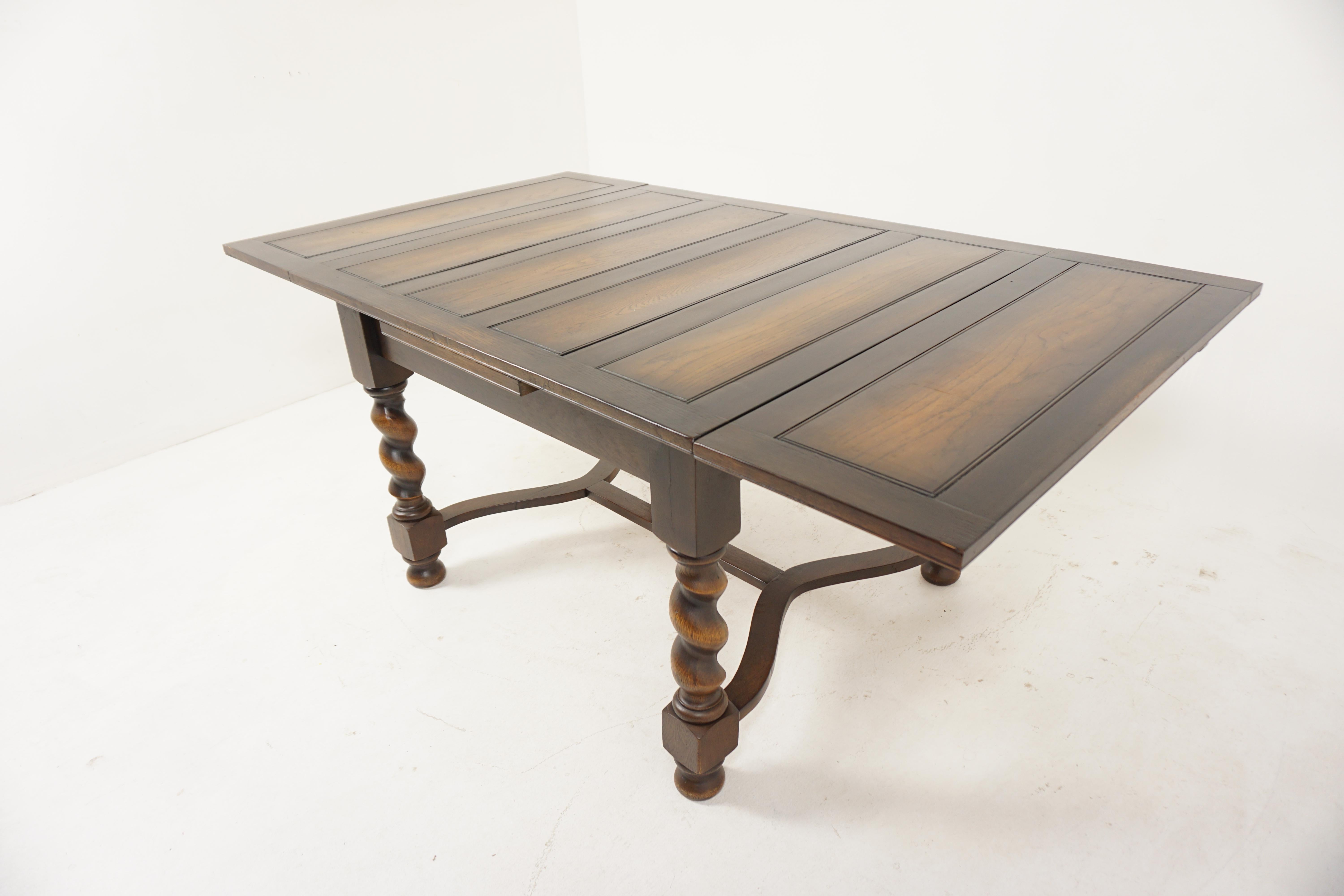 Antique Barley twist oak draw leaf, pull out dining table, Scotland 1920, B2919

Scotland 1920
Solid oak
Original finish
Solid oak Paneled top with a pair of pull out leaves on the ends
Table extends by 28
