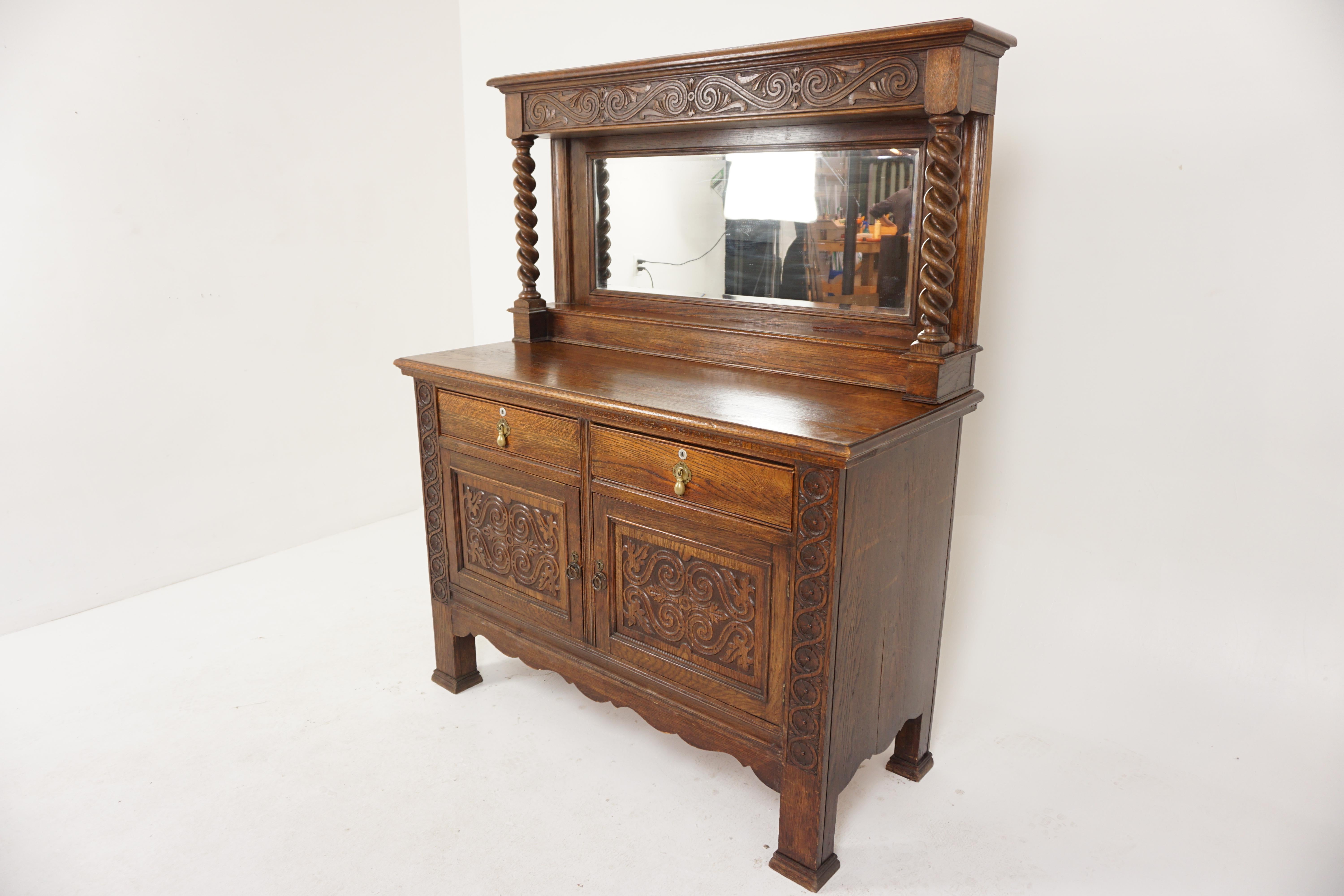 Antique barley twist oak mirror back sideboard, buffet, Scotland 1910, H390

Scotland 1910
Solid oak
Original finish
The sideboard comes into two pieces - the top and the base
The top has a carved cornice with a pair of thick barley twist columns on