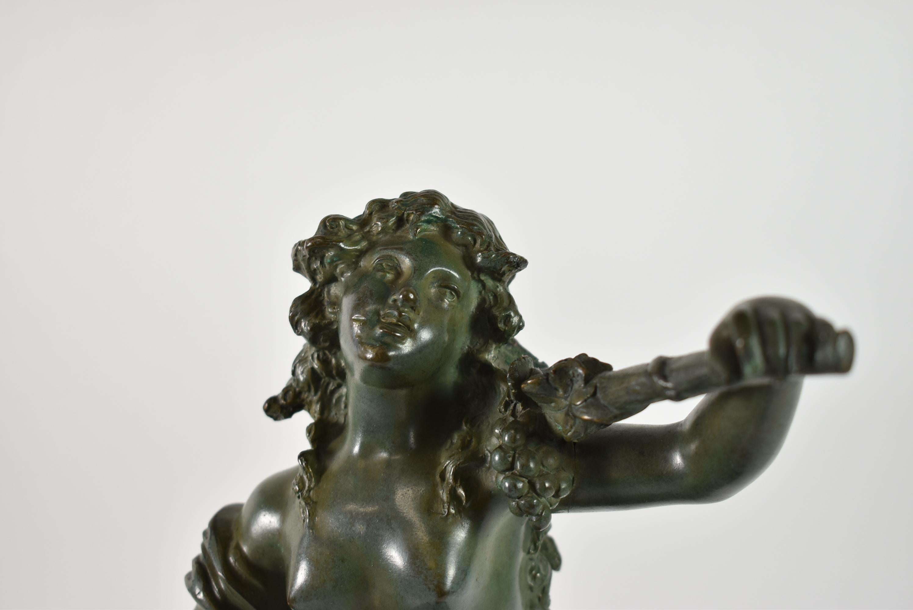 Antique cast bronze Baroque style sculpture of a nude female figure astride goatman. 14.5