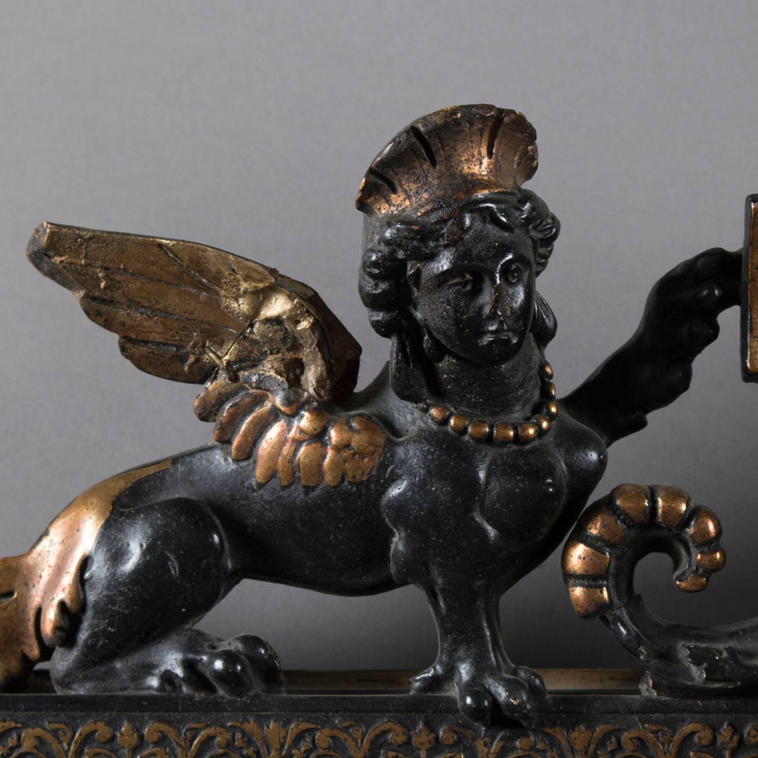 Beveled Antique Baroque Figural Sphinx Carved, Ebonized and Gilt over Mantel Mirror