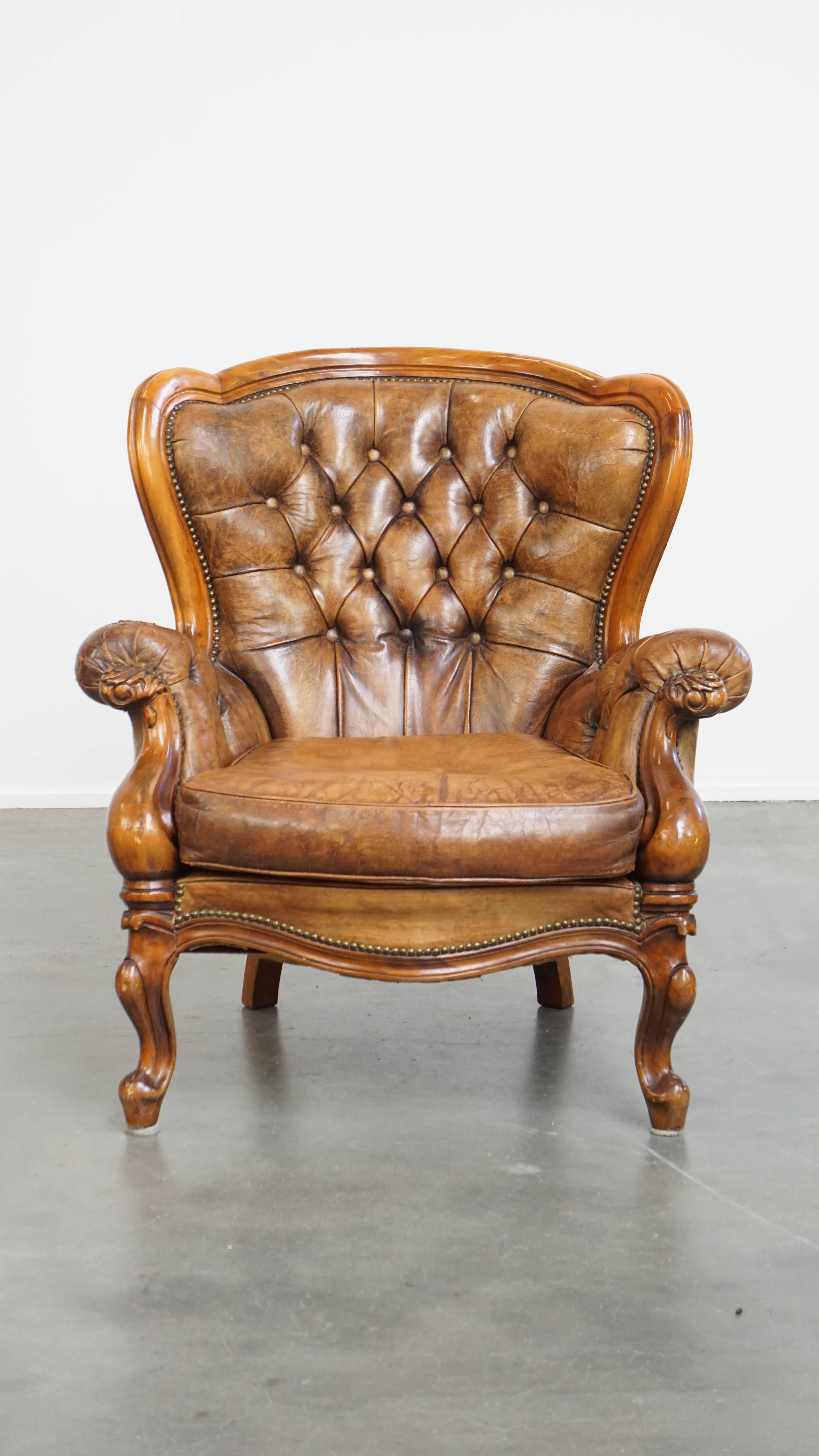 Offered here this charming antique Baroque sheepskin leather Chesterfield armchair with a beautiful patina.

In our opinion, not all furniture across all interior styles exudes timeless class and charm — but sheepskin leather pieces certainly do,