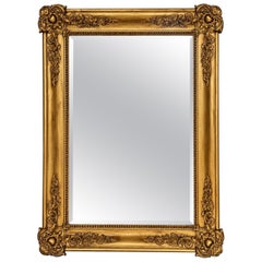Antique Baroque-Style Giltwood Mirror with Ornate Floral Carvings